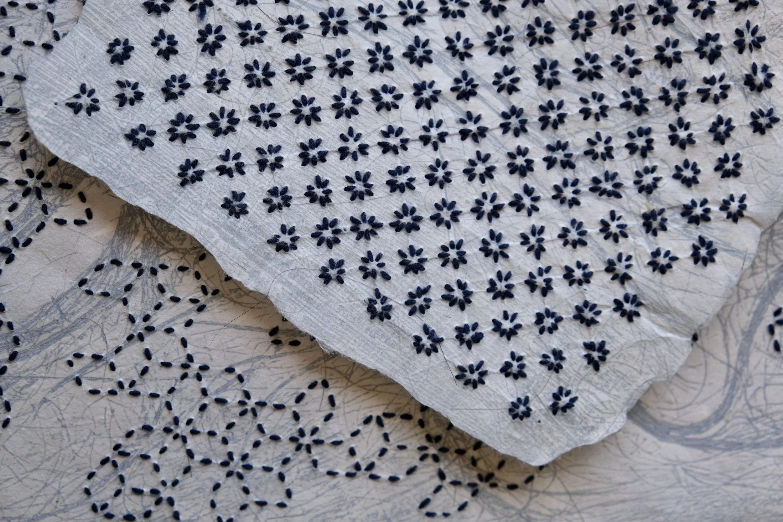 detail of burst and petals (from right to left)