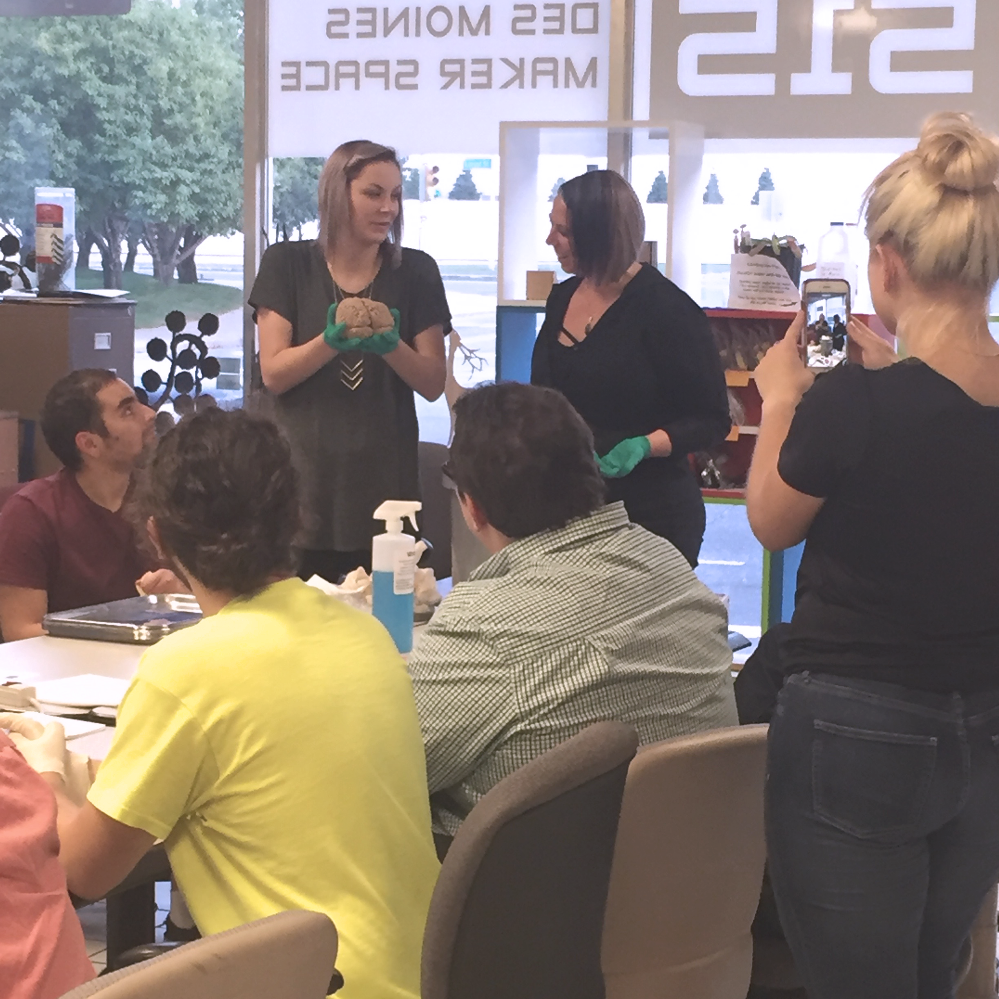 Next, Anatomy faculty from DMU introduced the preserved anatomical specimens including several brains, hearts, kidneys, sections of the stomach, and even an ovarian cyst. Some of the participants had never held preserved organs before!