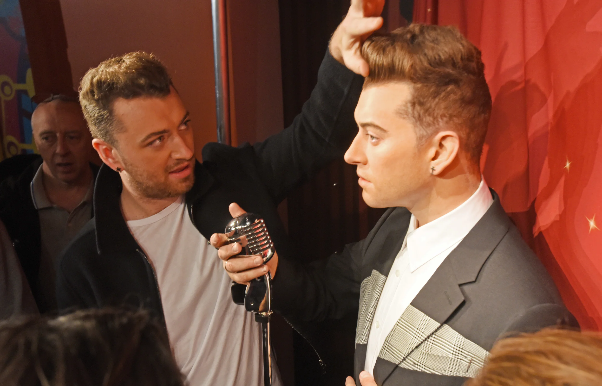  Grammy winning singer Sam Smith confronts his wax likeness at Madame Tussauds in San Francisco 