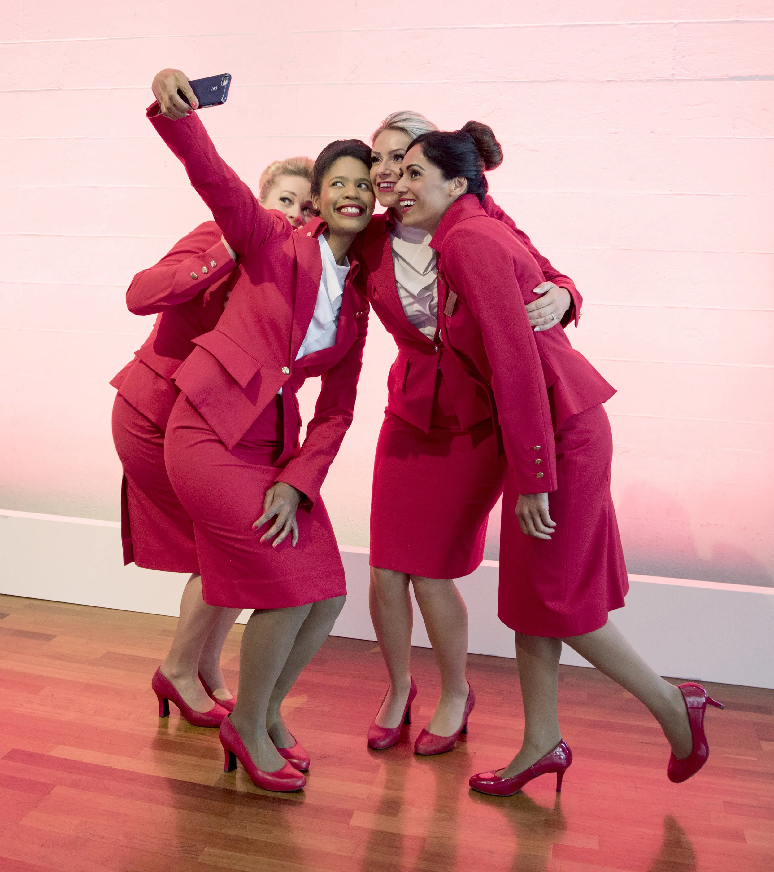  Flight Attendants at a Virgin product launch 