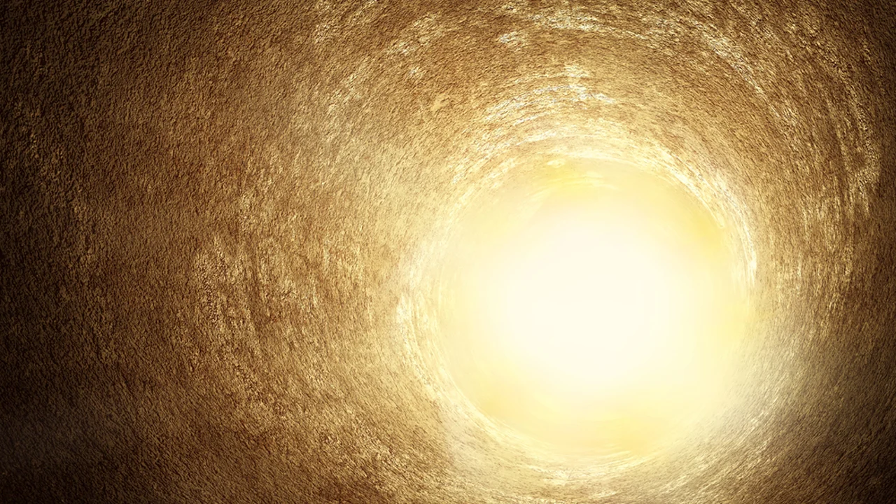 Abstract image of light at the end of a tunnel representing insight and the development of INFJ Introverted Intuition (Ni).