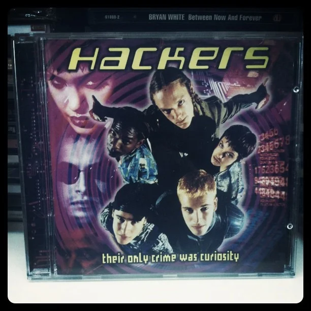 " Hackers is a 1995 American crime film directed by Iain Softley and starring Jonny Lee Miller , Angelina Jolie , Renoly Santiago , Matthew Lillard , Jesse Bradford , Lorraine Bracco , and Fisher Stevens . The film follows a group of high school hackers and their involvement in a corporate extortion conspiracy." wikipedia