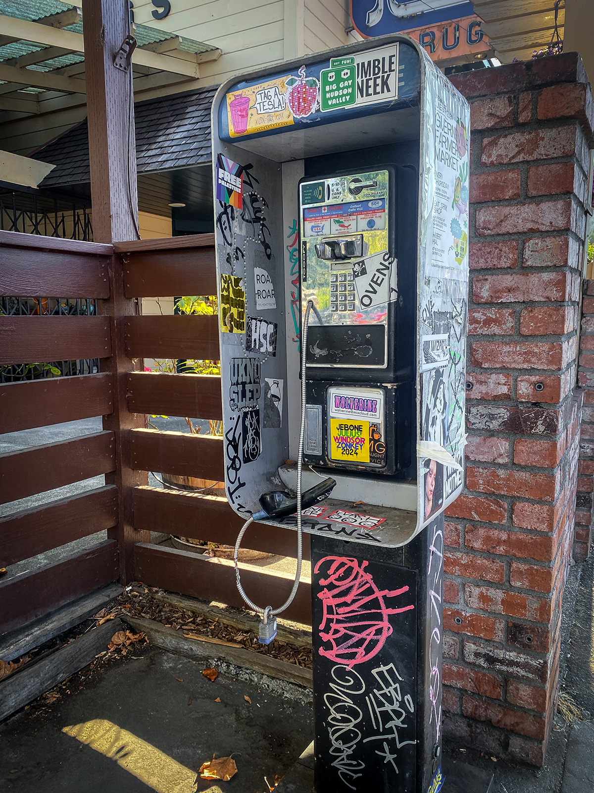 vandalized public phone .png