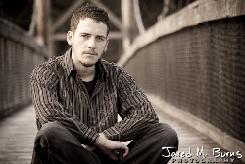Duvall Cedarcrest Senior Guy Portrait Photographer - John McDonald Park, Carnation - Sitting on bridge
