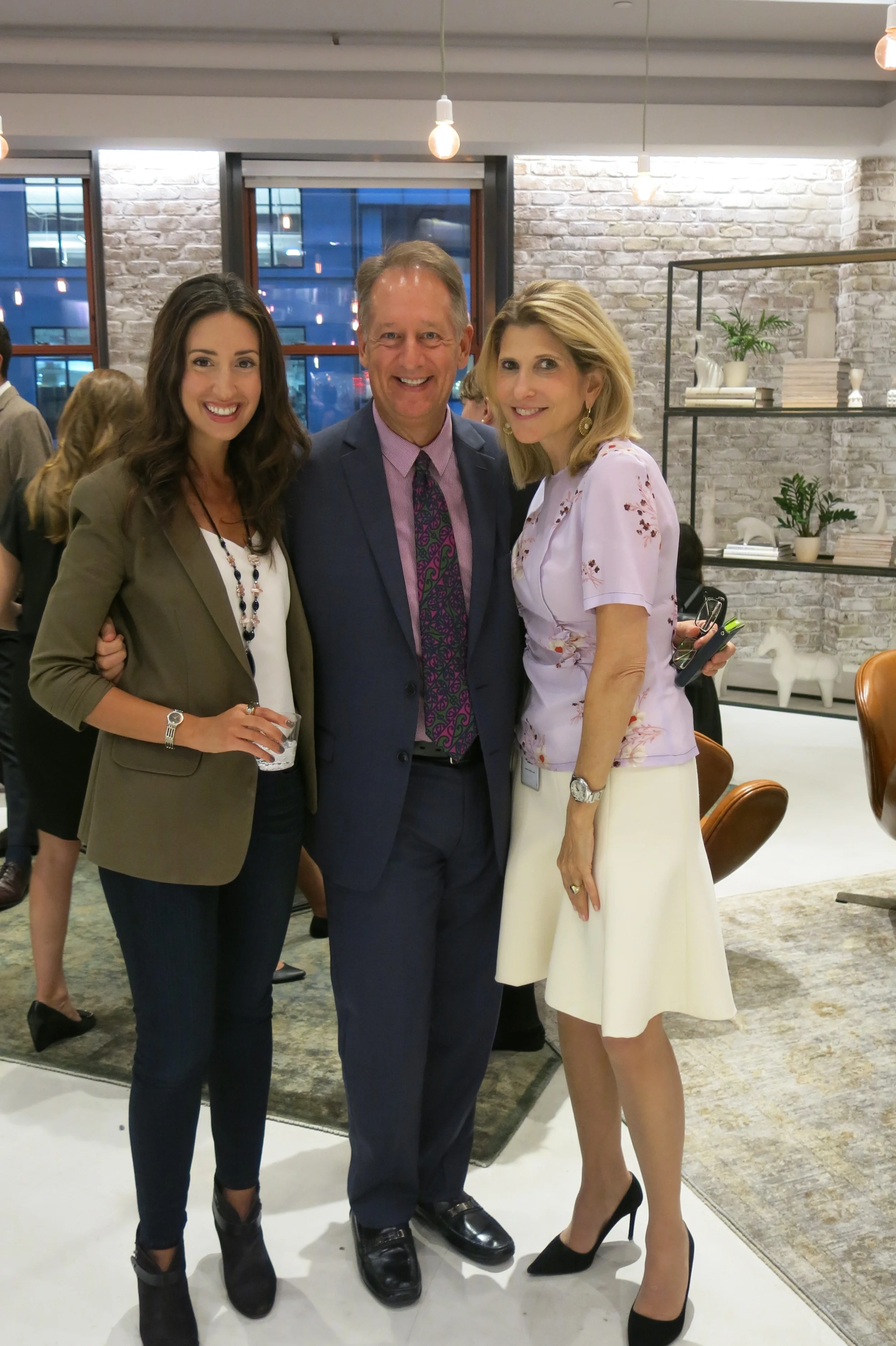 Erica Orange pictured with Doug Evans and Sheri Rosenfeld