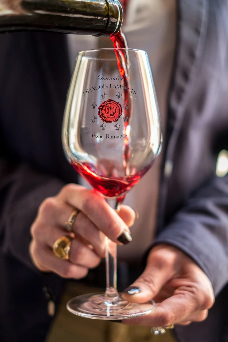 Nathalie Lamarche with a glass of 'La Grand Rue', Grand Cru Monopole. Domaine Francois Lamarche, Burgundy