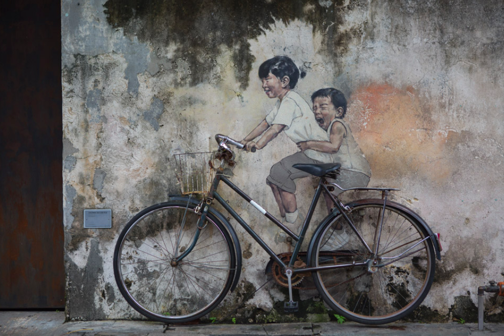 Zweiräder, Malaysias beliebteste Transportmittel. Egal, ob Stadt, Land oder Wand.