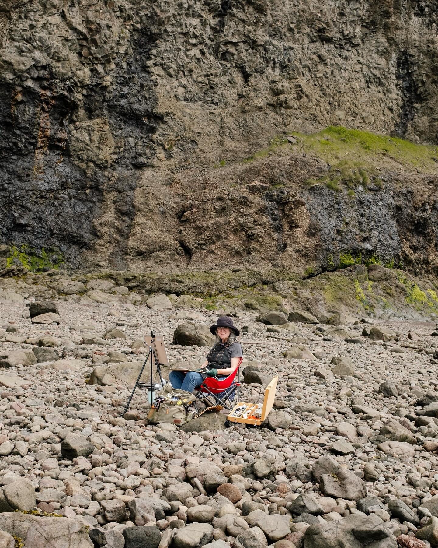 While meandering along a beach one morning, I came across @theresamacknight who was painting the same rocks I was photographing.

As I walked by we started chatting and she asked if I could take a photo of her on her phone, and I asked if I could tak