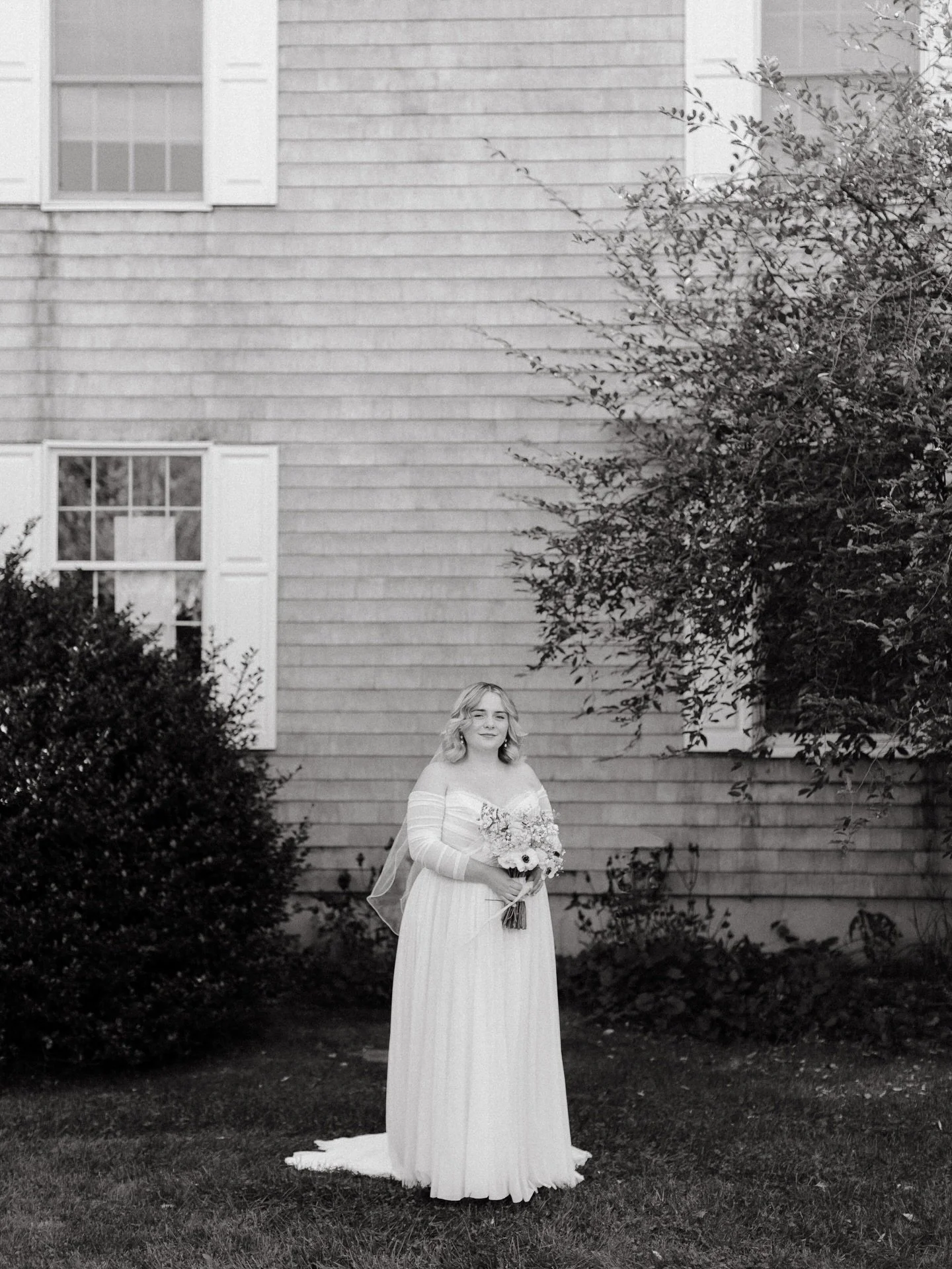Grace, outside an Airbnb, where she got ready on her wedding day.

As observational as I am on a wedding day, I find a whole lot of value in those second-in-time portraits when people are fully aware of me and taking a few moments to hold those forev