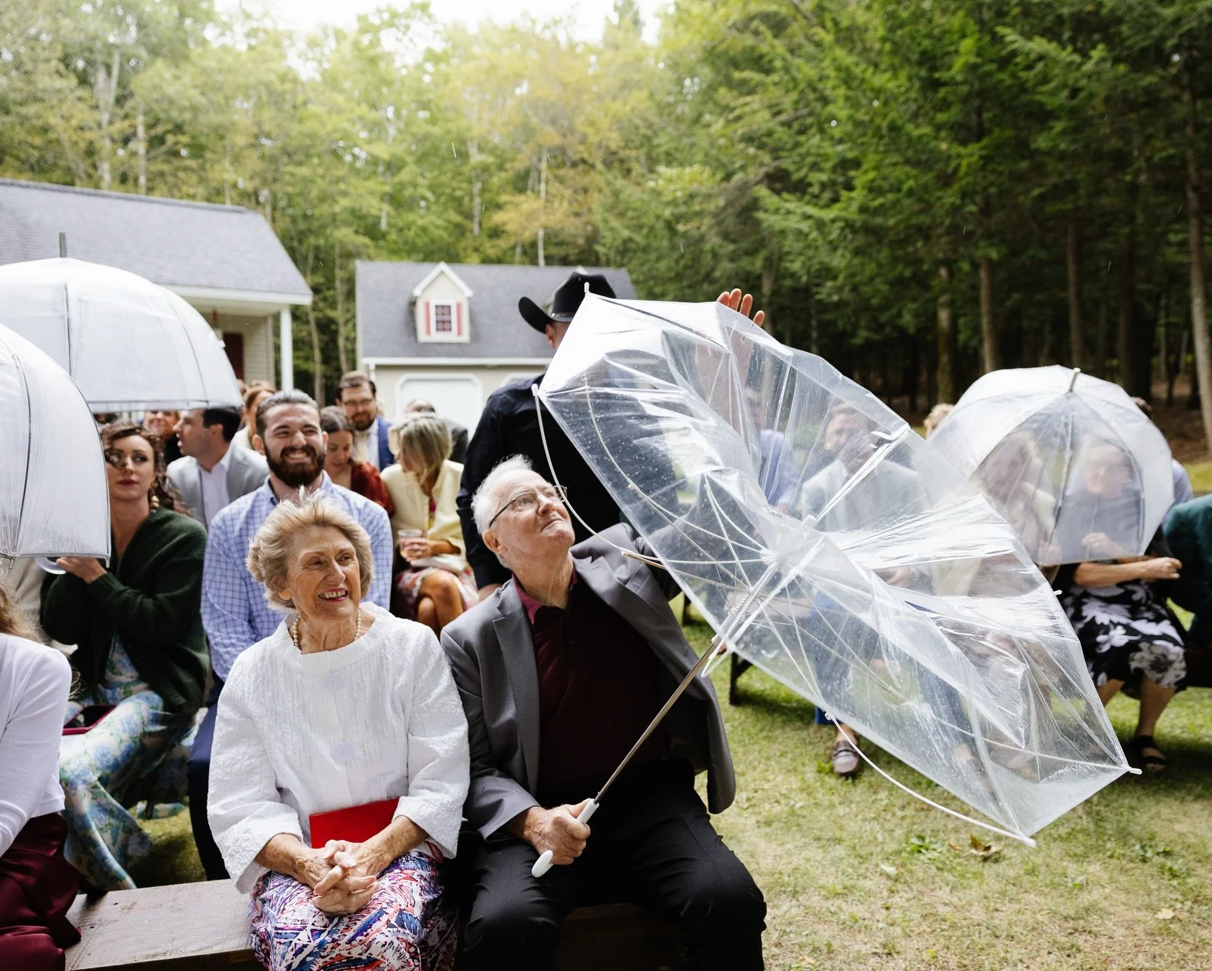The wind and rain came just as everyone was beginning to gather for the ceremony, and all I saw were smiles on the guests&rsquo; faces.

We passed out umbrellas and thanks to Becca at @rglweddingsandevents, the call was made to get back in the buses 