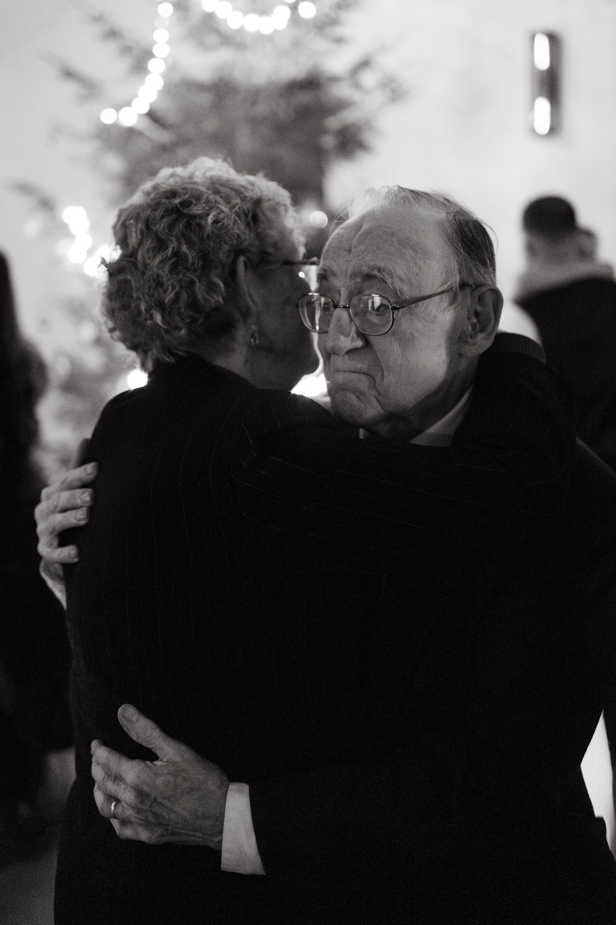 A couple dances at a wedding at The Barn at Hatch Point in Bowdoinham, Maine. Photography by Sienna Renee Photography.