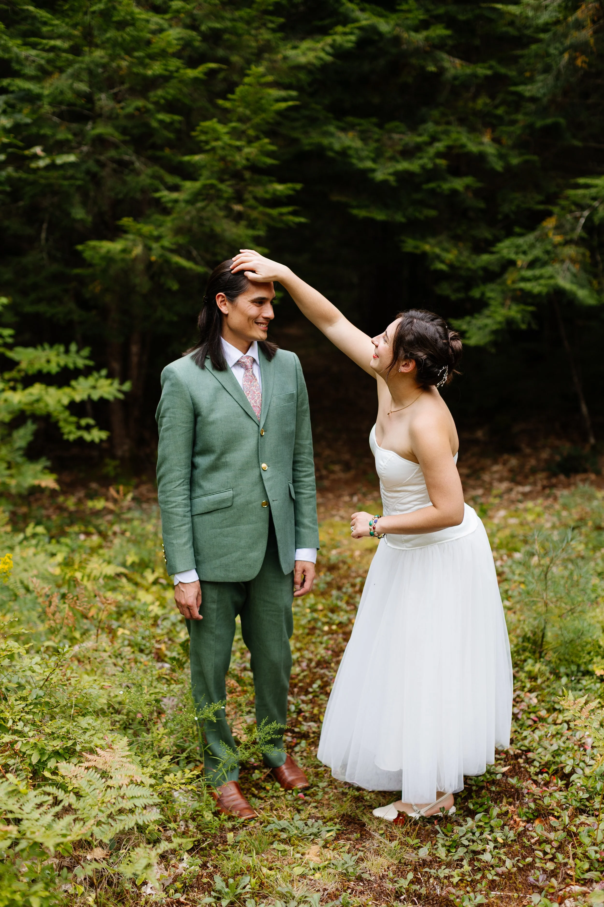 A couple during their backyard wedding celebration in North Berwick, Maine. Photography by Sienna Renee Photography.