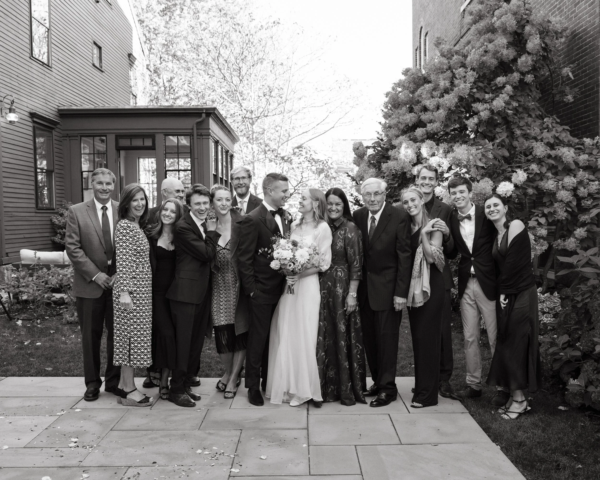 Family portrait during an intimate wedding at The Thomas Delano House in Portland, Maine. Photography by Sienna Renee Photography.