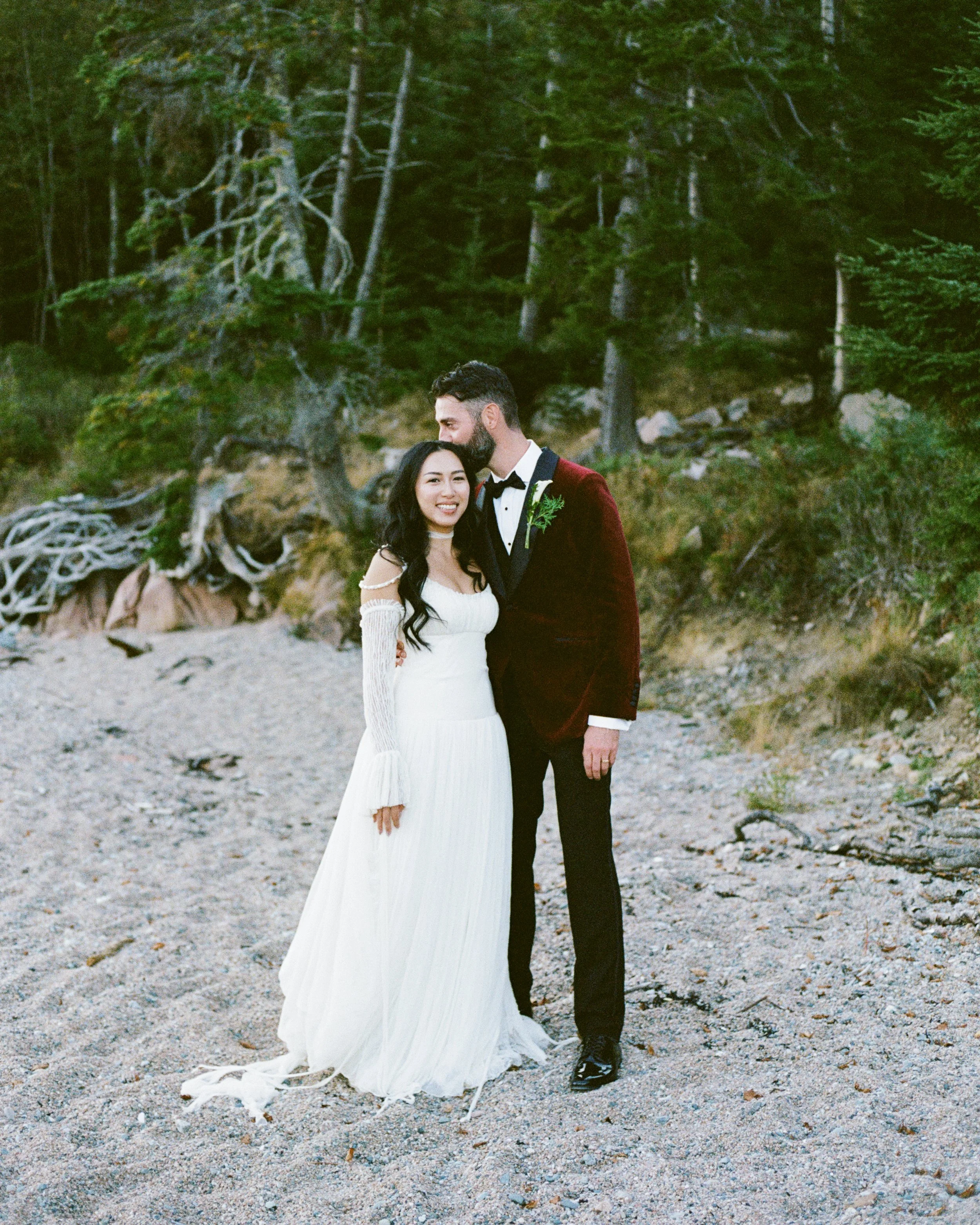 A couple on film during their intimate wedding weekend at Aragosta in Deer Isle, Maine. Photography by Sienna Renee Photography.