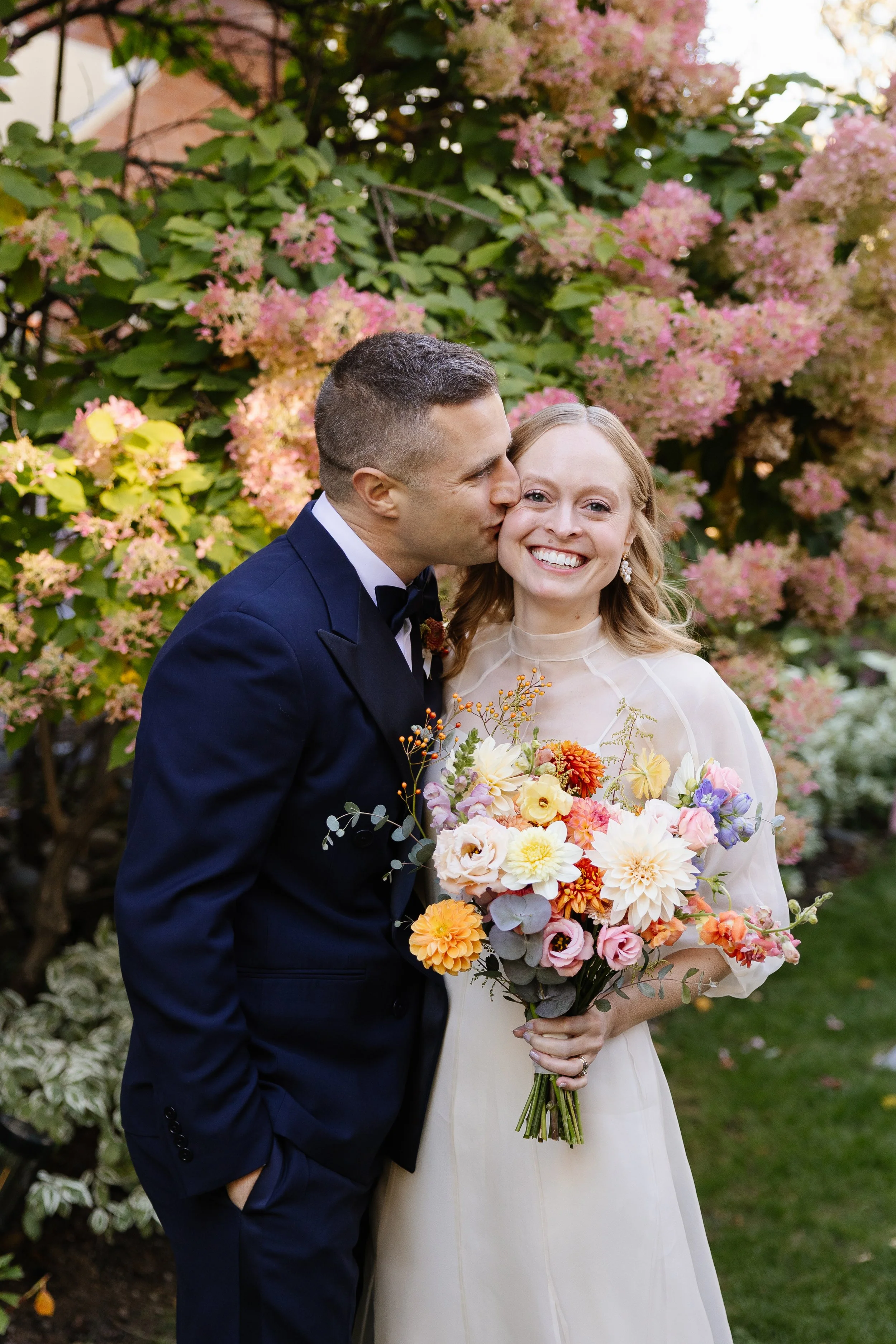 A couple during their intimate wedding day at The Thomas Delano House in Portland, Maine. Photography by Sienna Renee Photography.