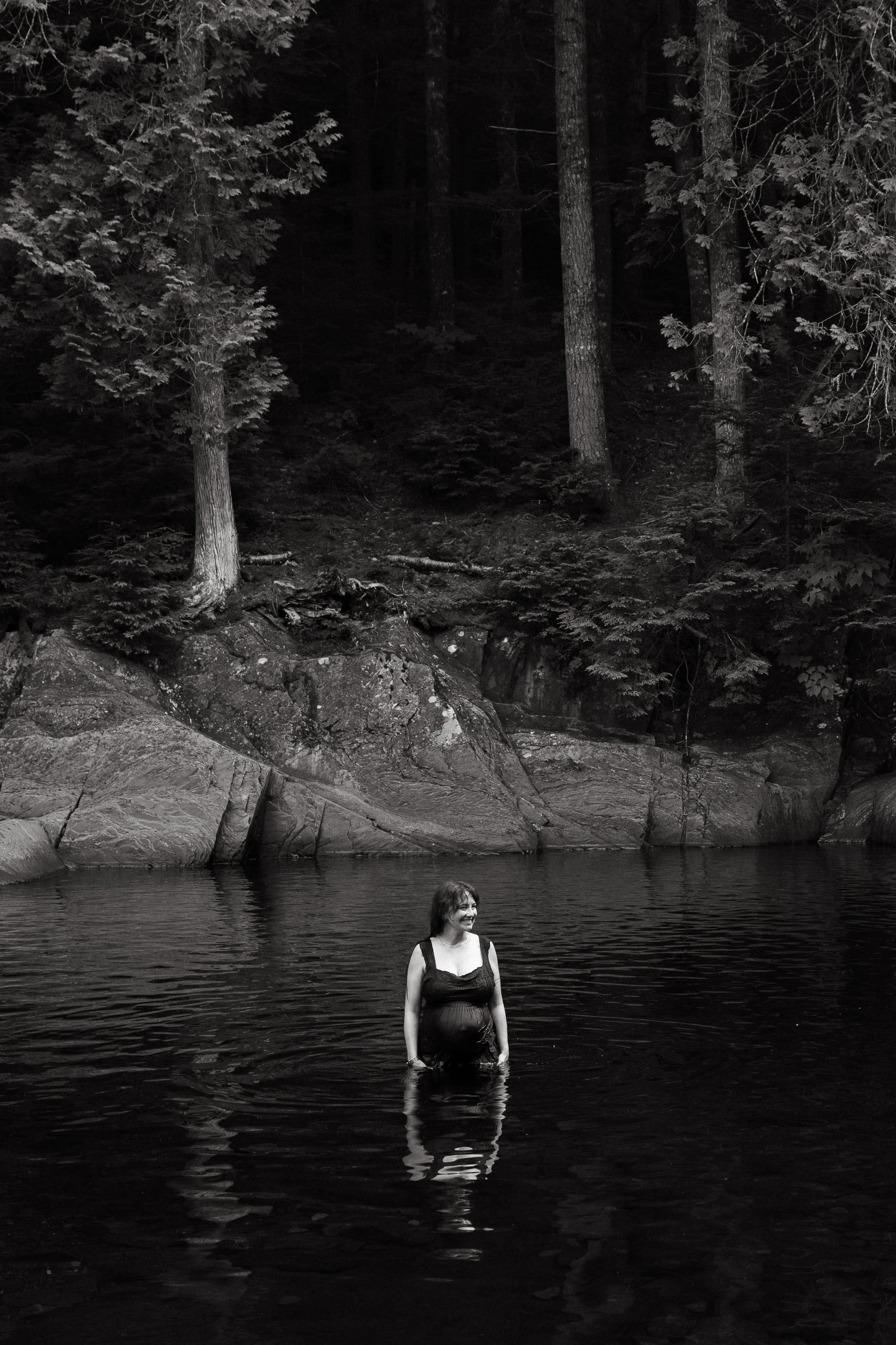 A couple during a photo session in the Moosehead Lake Region of Maine. Photography by Sienna Renee Photography.