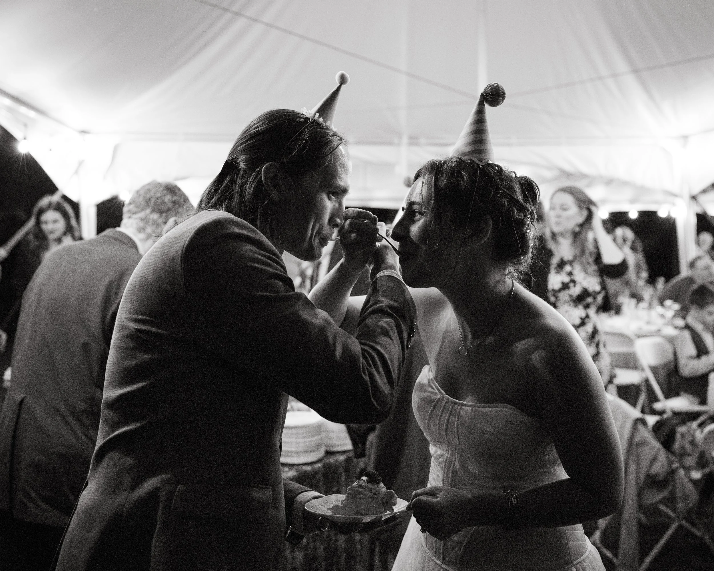 A couple during their small backyard wedding in Midcoast Maine. Photography by Sienna Renee Photography.