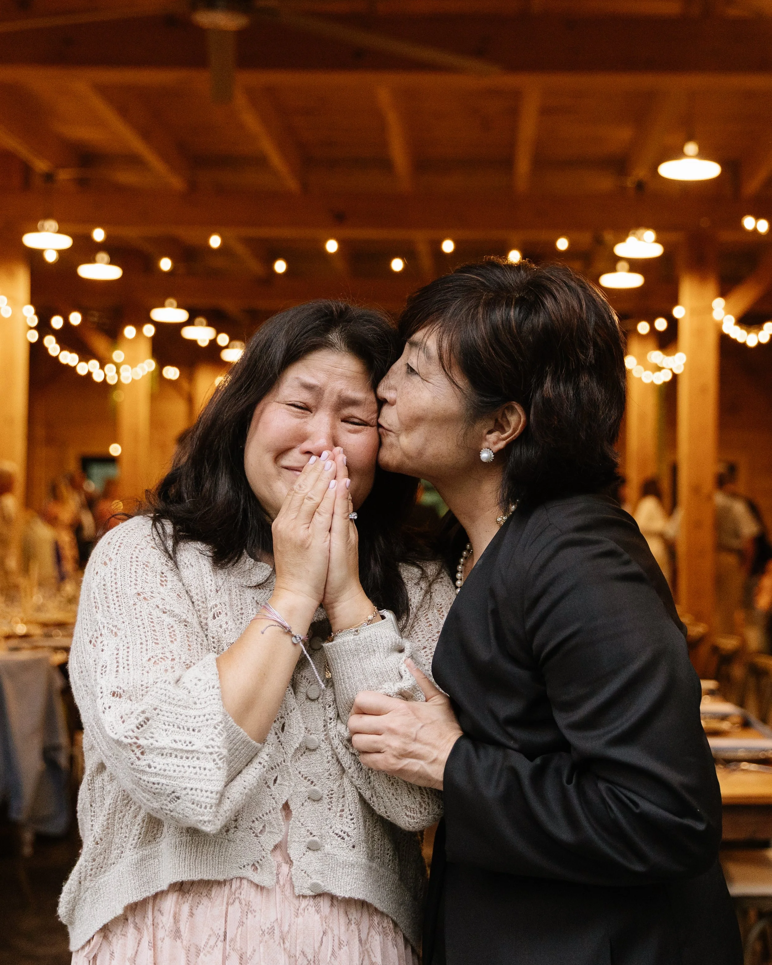 Family during an small backyard wedding in Moosehead Lake, Maine. Photography by Sienna Renee Photography.