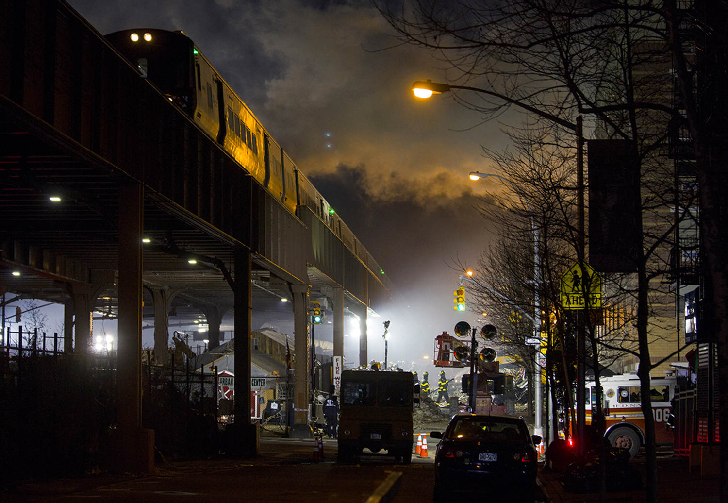  Smoke rises at fatal building explosion site, Harlem, 2014 