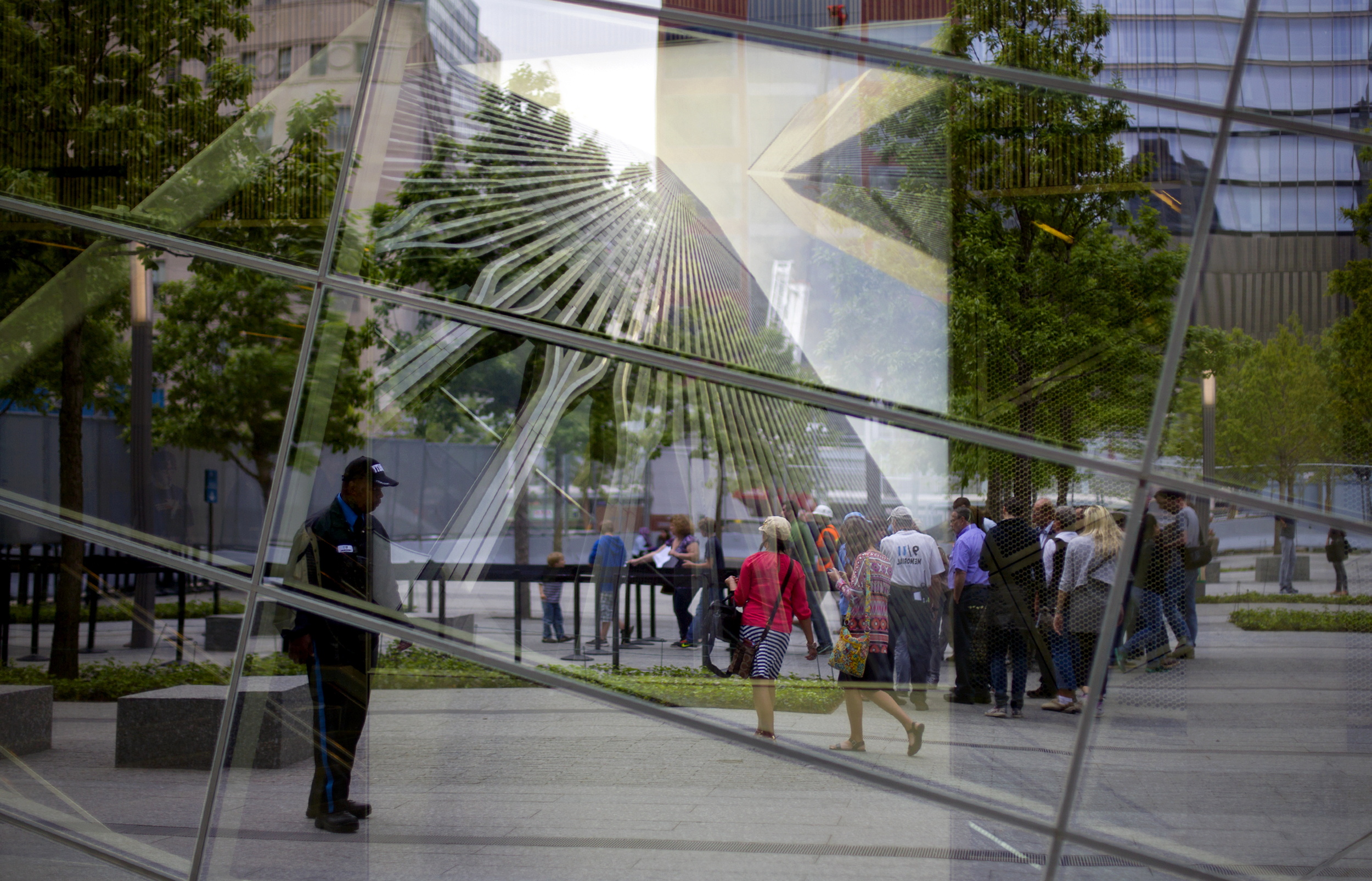  Reflections at the 9/11 Memorial Museum blend past, present, 2014   