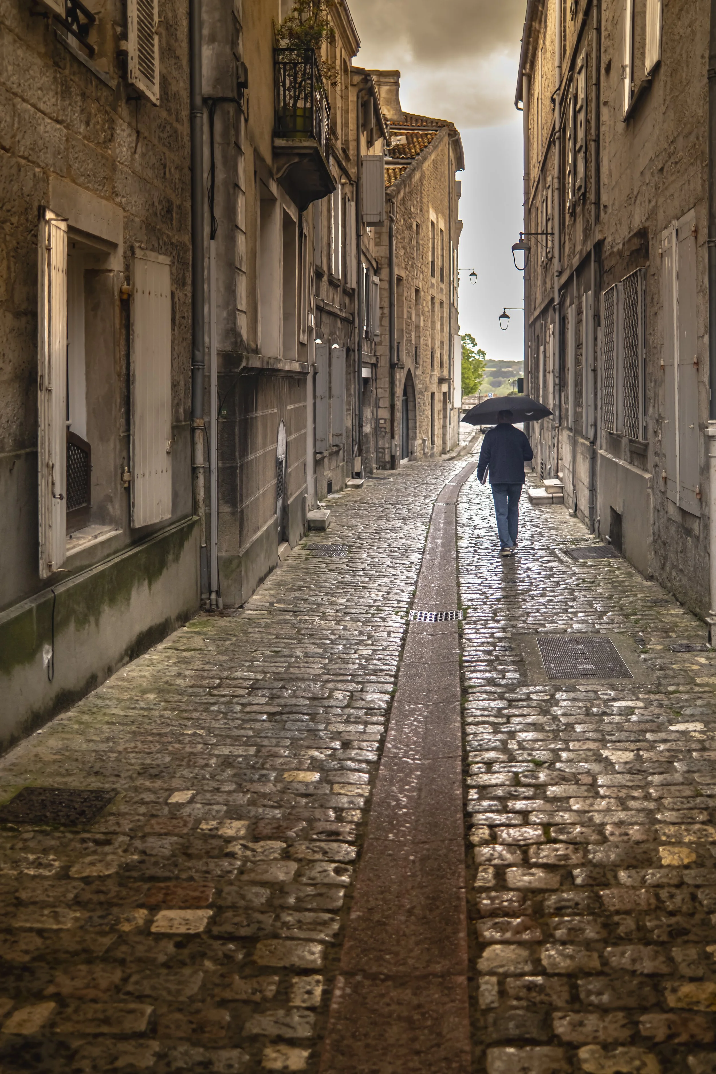 Rain, Cobbles, Umbrella: Angouleme