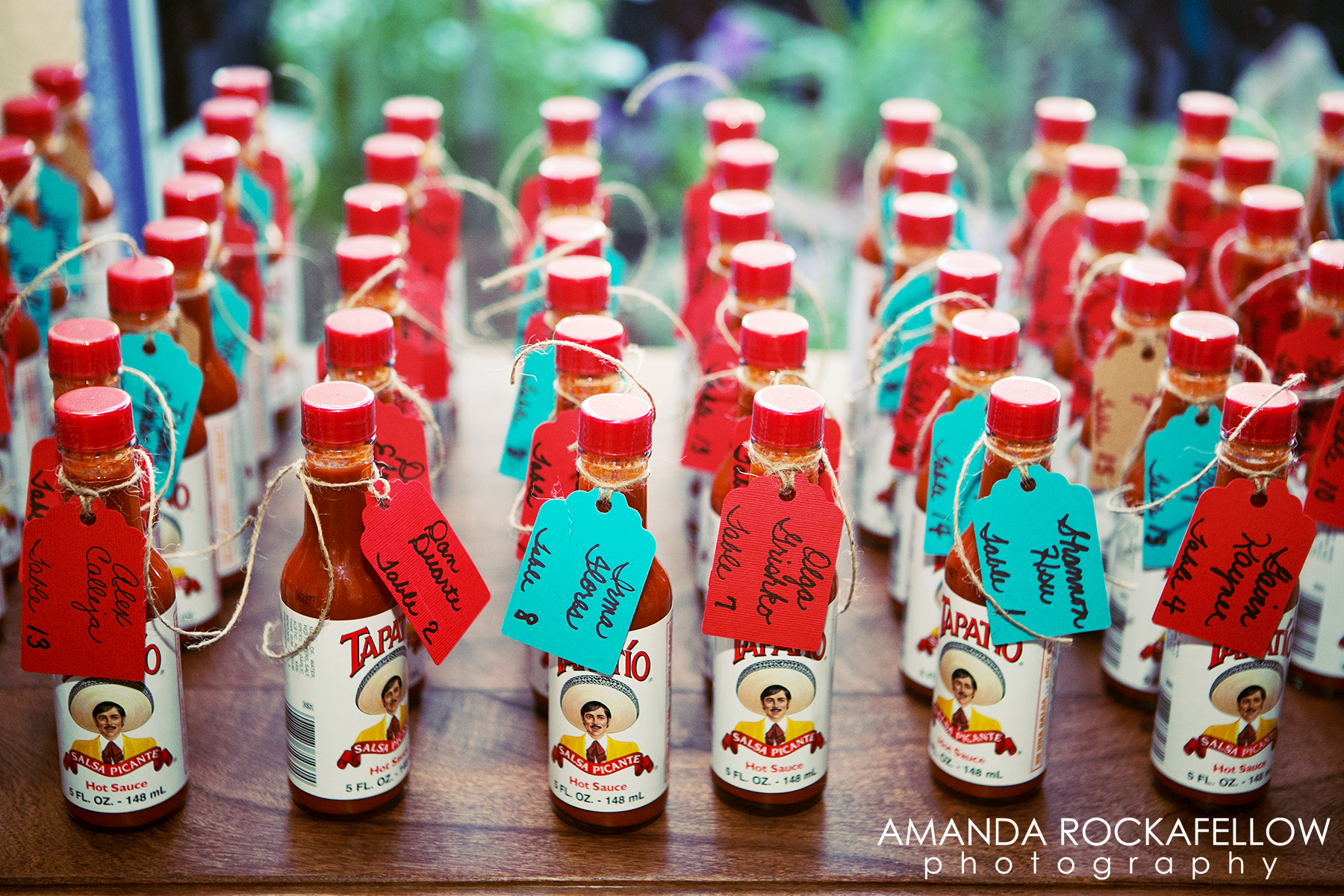 There was an adorable sign, among others made by the Bride's Mom, telling guests to "Find their seat, HOT STUFF!" as they entered into the reception space.