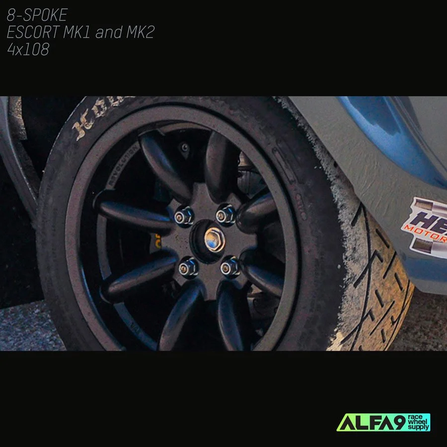 FORD_DENSPORT_ESCORT_BLACK_9x15_8spoke_Wheels.jpg