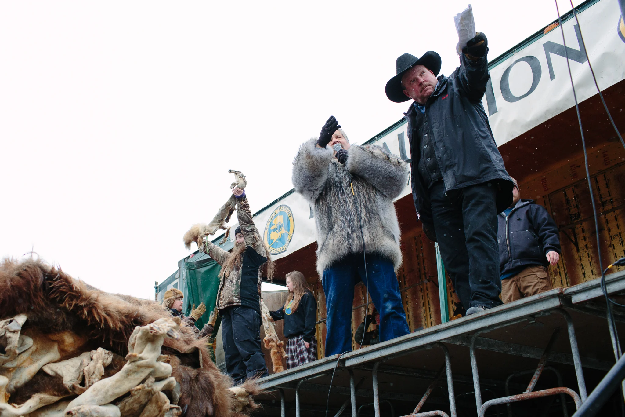 Volunteer auctioneers at the Fur Rondy Horn and Hide Auction.