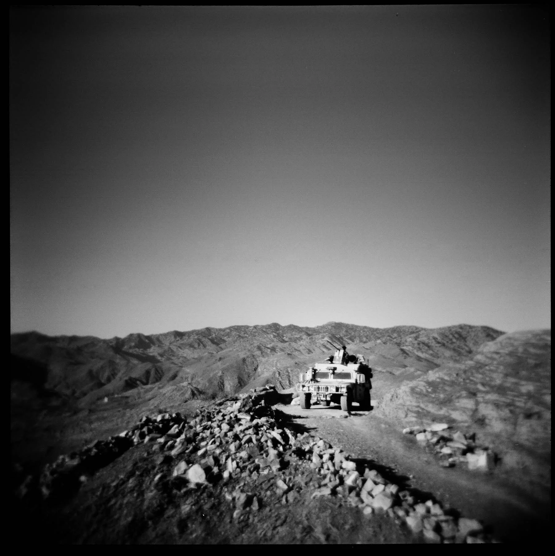 An Afghan Local Police vehicle sets up an overwatch position over the Pirkowti valley in Paktika province, Afghanistan. 2011.
