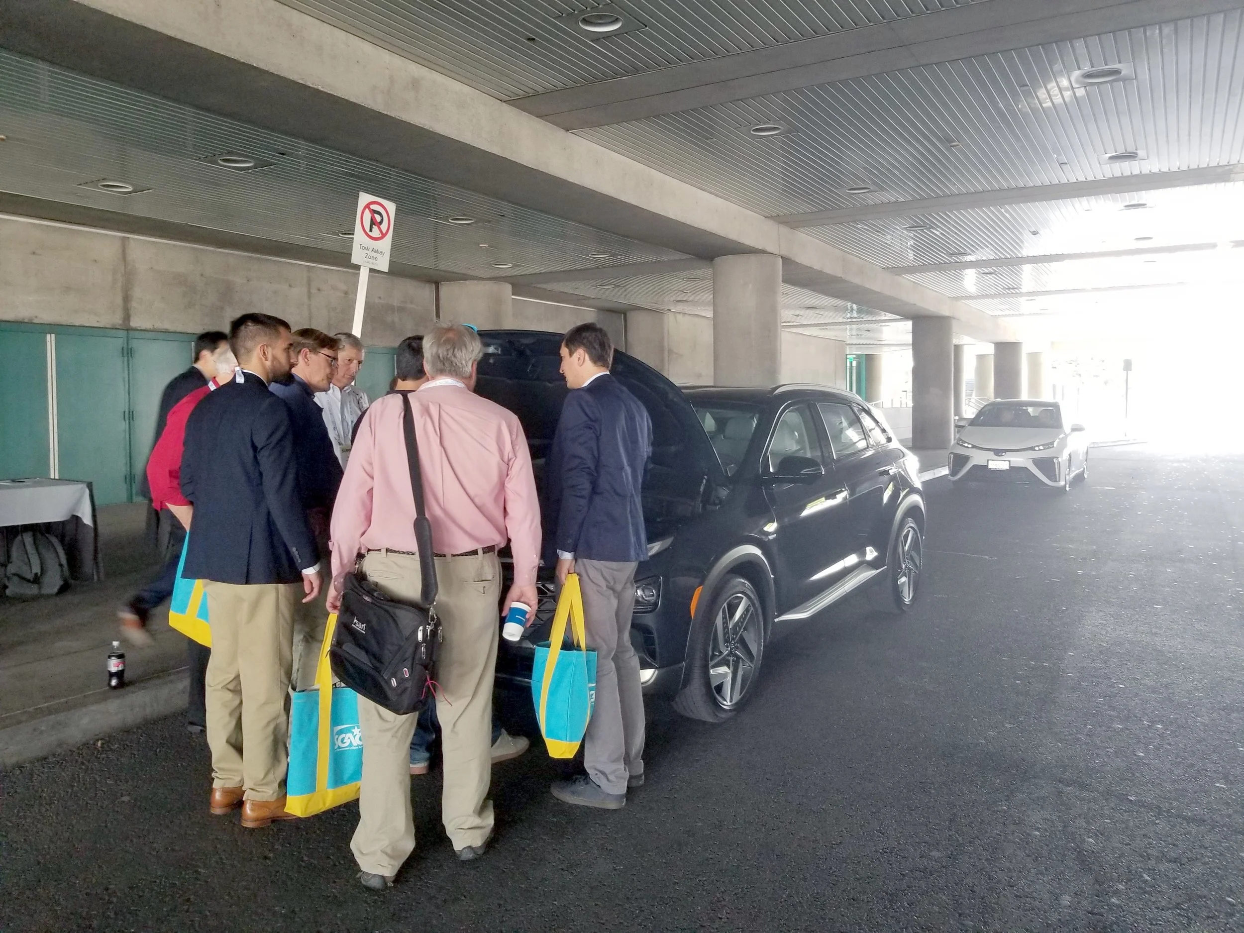 A group of NCSL attendees looks under-the-hood of the 2019 NEXO, Hyundai’s newest FCV model.