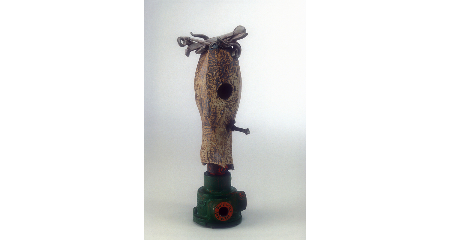 Head with Nest Over Herbicide Pump