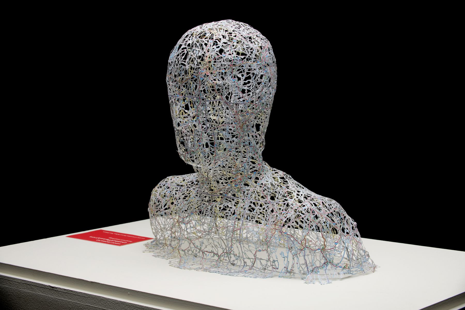 Untitled (Portrait), 20x20x10", Hand-cut road map, 2016