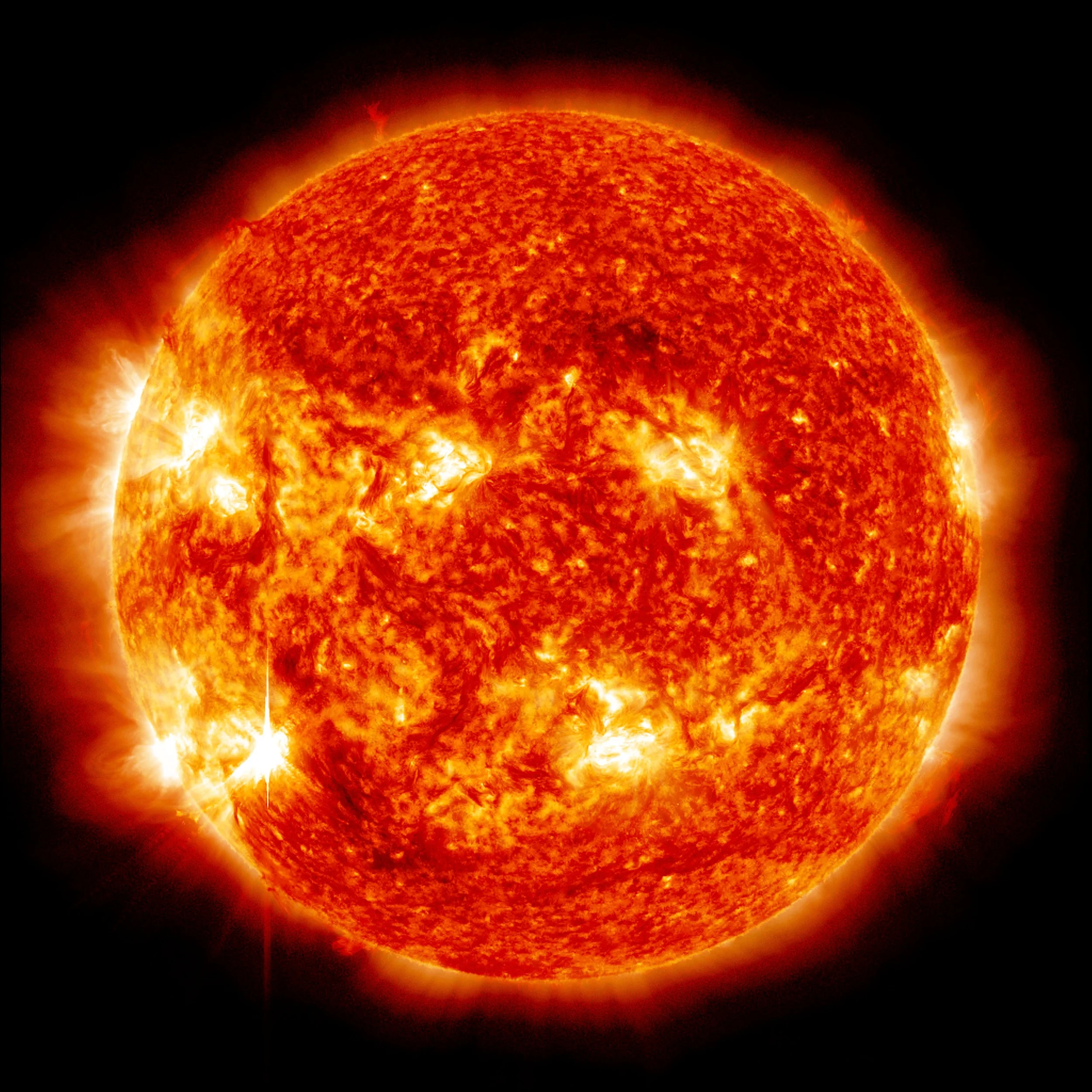 Visible in the lower left corner, the sun emitted an M6 solar flare on Nov. 12, 2012, which peaked at 9:04 p.m. EST. This image is a blend of two images captured by NASA's Solar Dynamics Observatory (SDO), one showing the sun in the 304 Angstrom wavelength and one in the 193 Angstrom wavelength. Credit: NASA/SDO