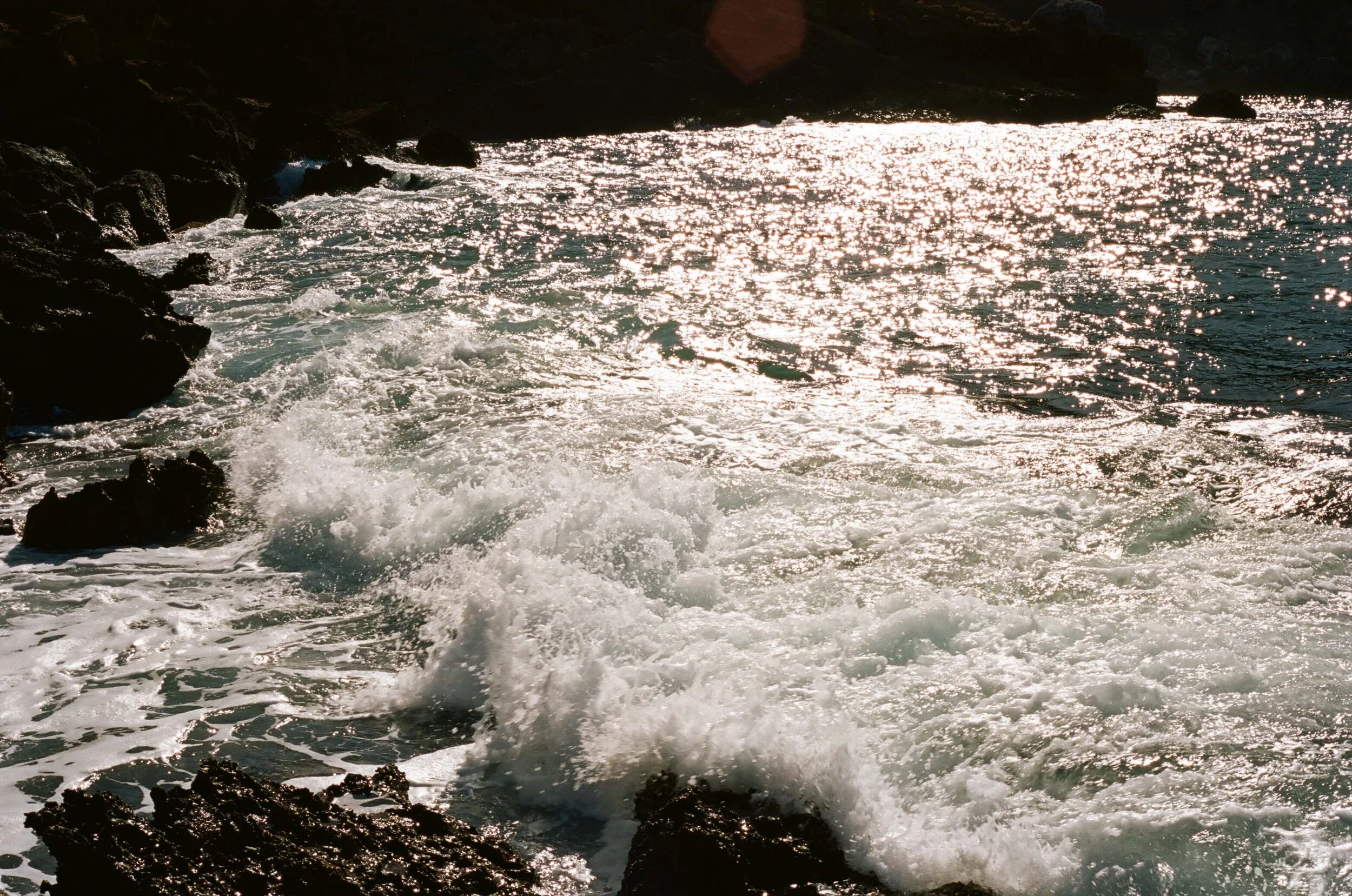 Waves crash along the coast of Sicily.