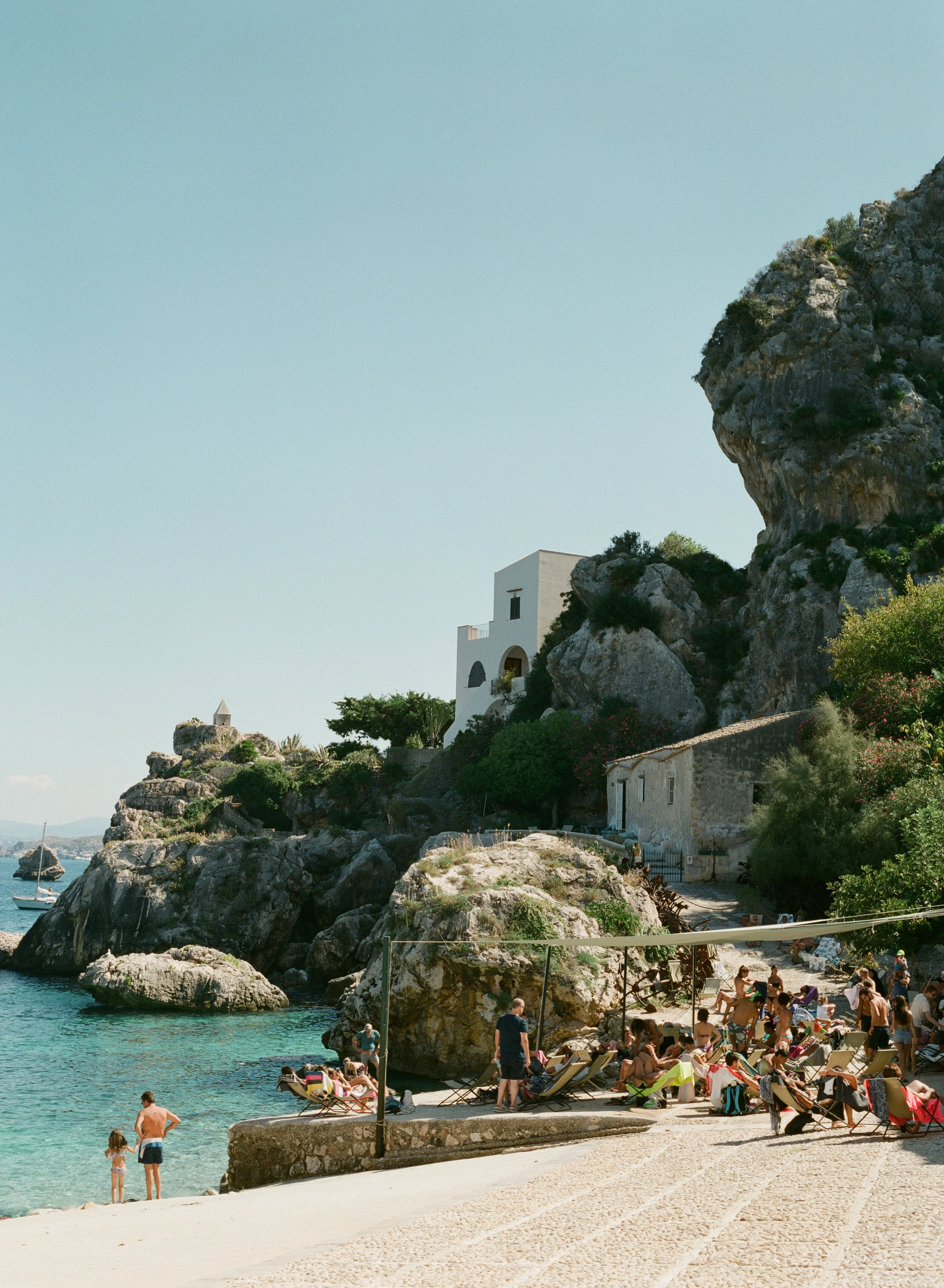 Seaside swimmers at Tonnara di Scopello.