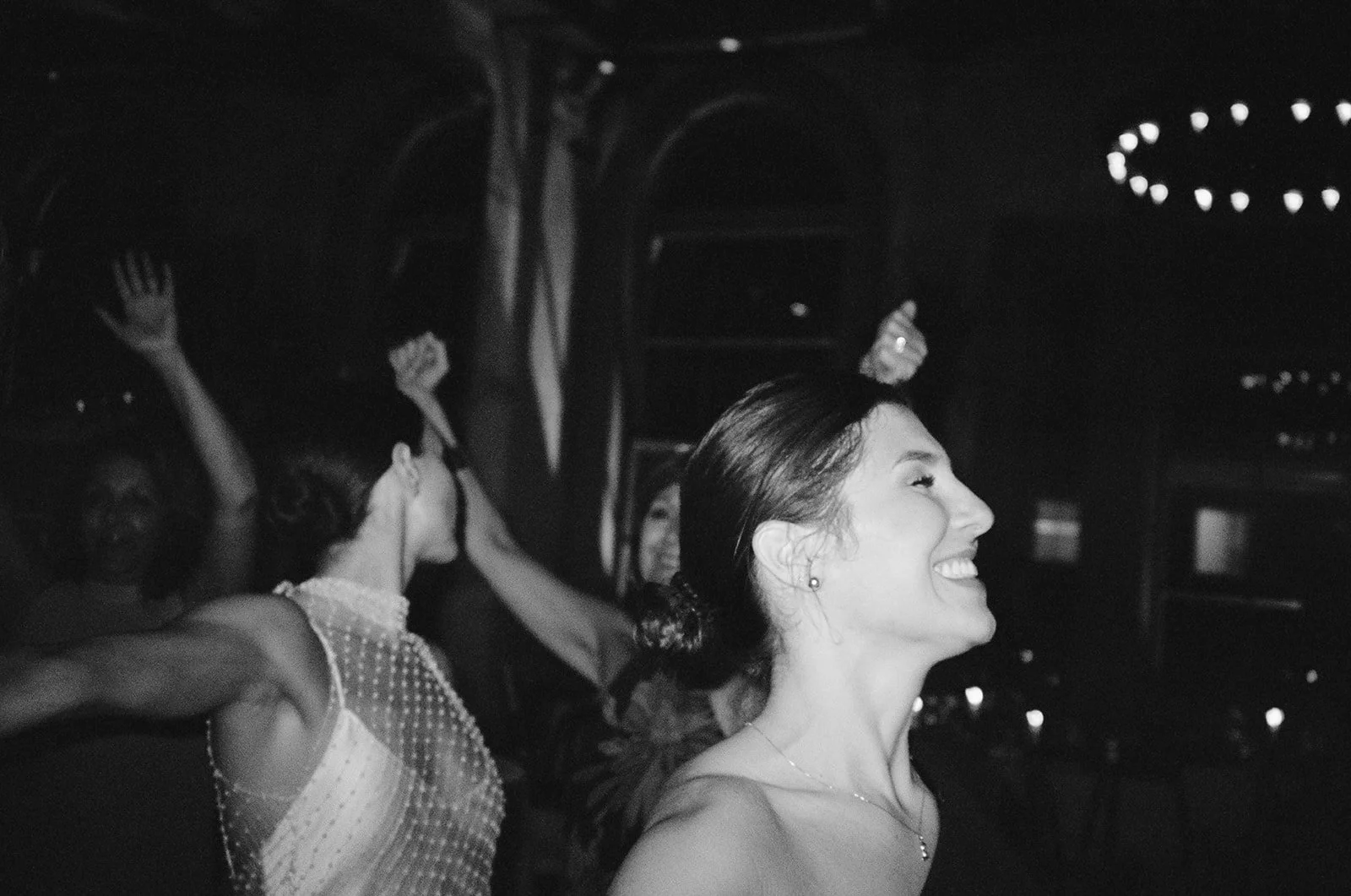 Wedding guests dances at ballroom reception at Savannah, Georgia wedding.