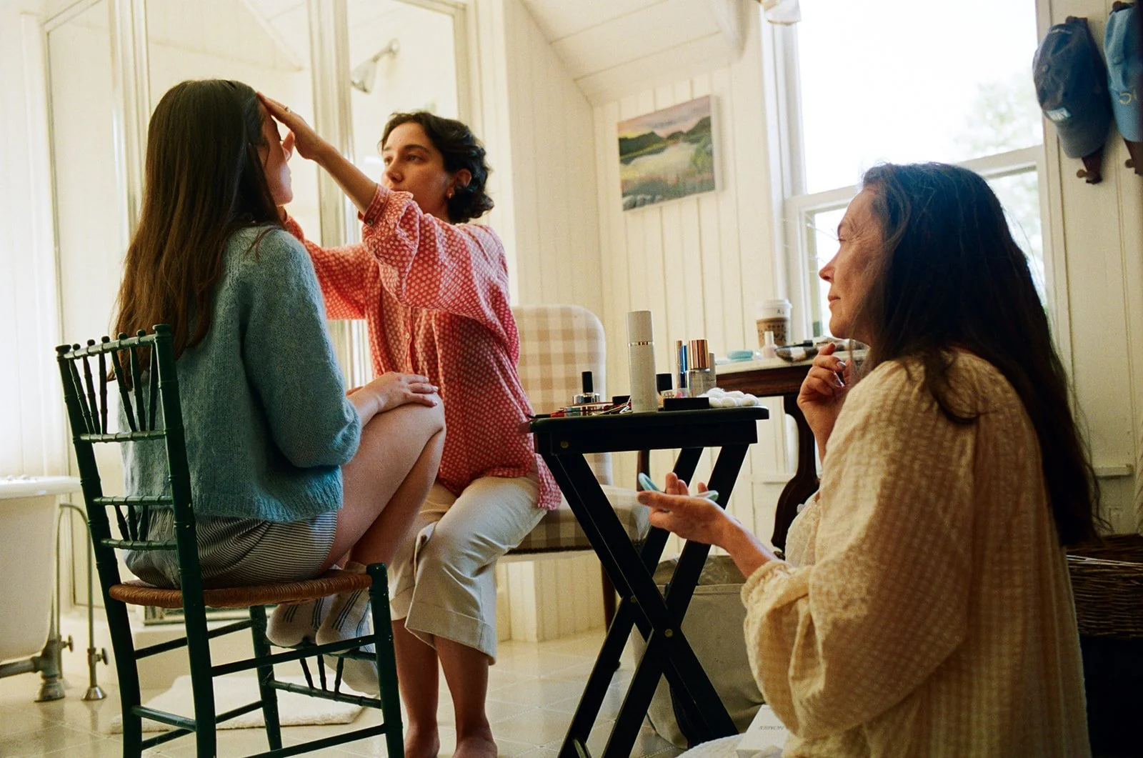 Bride gets ready in house on Cape Cod in Massachusetts.