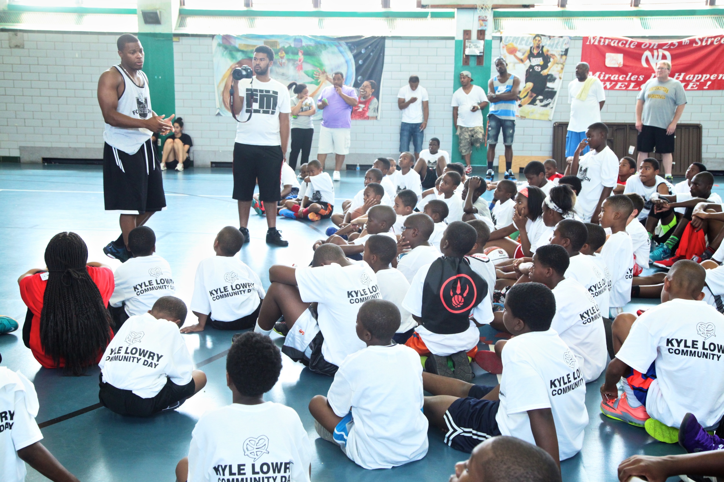 On August 16th, 2014, the Kyle Lowry Skills Clinic and Community Day returned to North Philadelphia's Hank Gathers Recreation Center for its second installment; this time with the added excitement of the inaugural Kyle Lowry's Rising Stars Challenge. A very big thank you to our volunteers, our sponsors FamJuice, Herr's, BodyArmour, Shoprite, Adidas and Shotloc , and most importantly, the community for welcoming us with open arms. Check out the photos from the day HERE and the recap below.