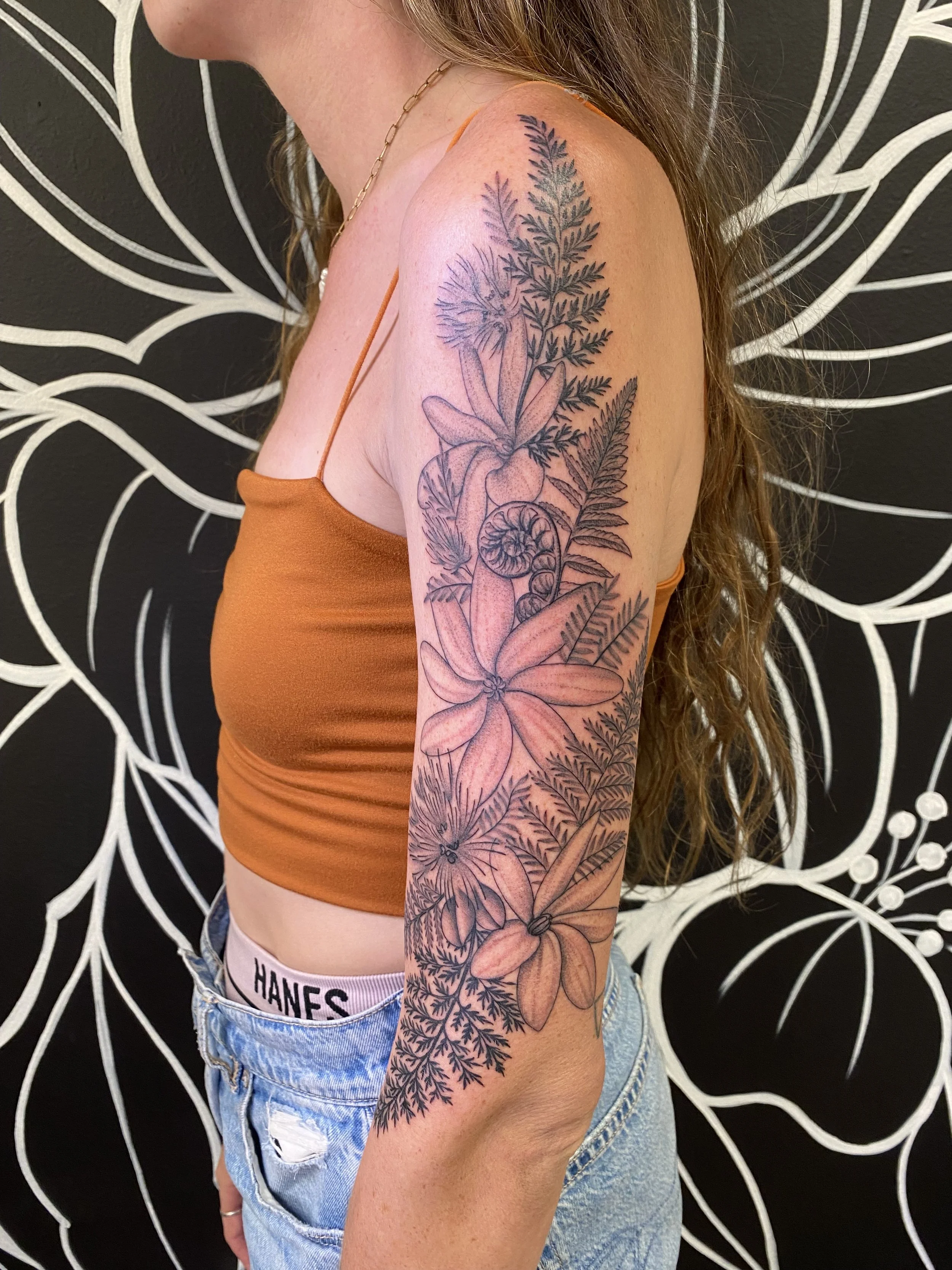 Native flower sleeve with ferns and tiare gardenias