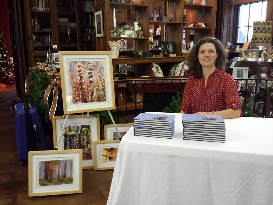 signing books illustrated with my paintings at the Museum open house.