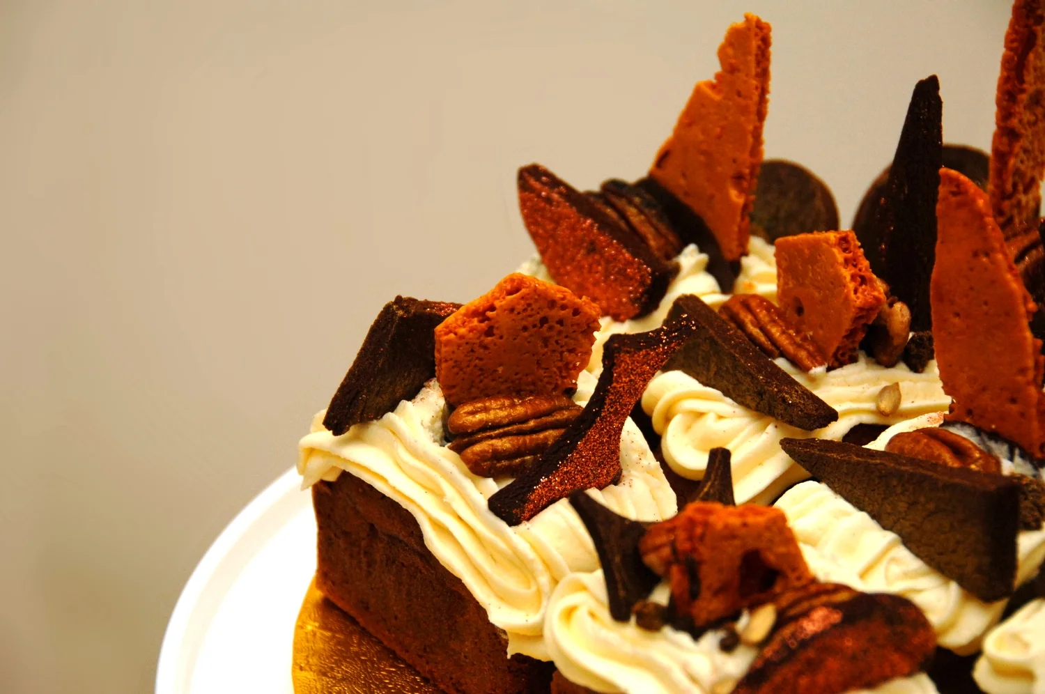  Banana loaves with honeycomb shards, glitter chocolate biscuits, golden pecans &amp; salted caramel cream cheese frosting 
