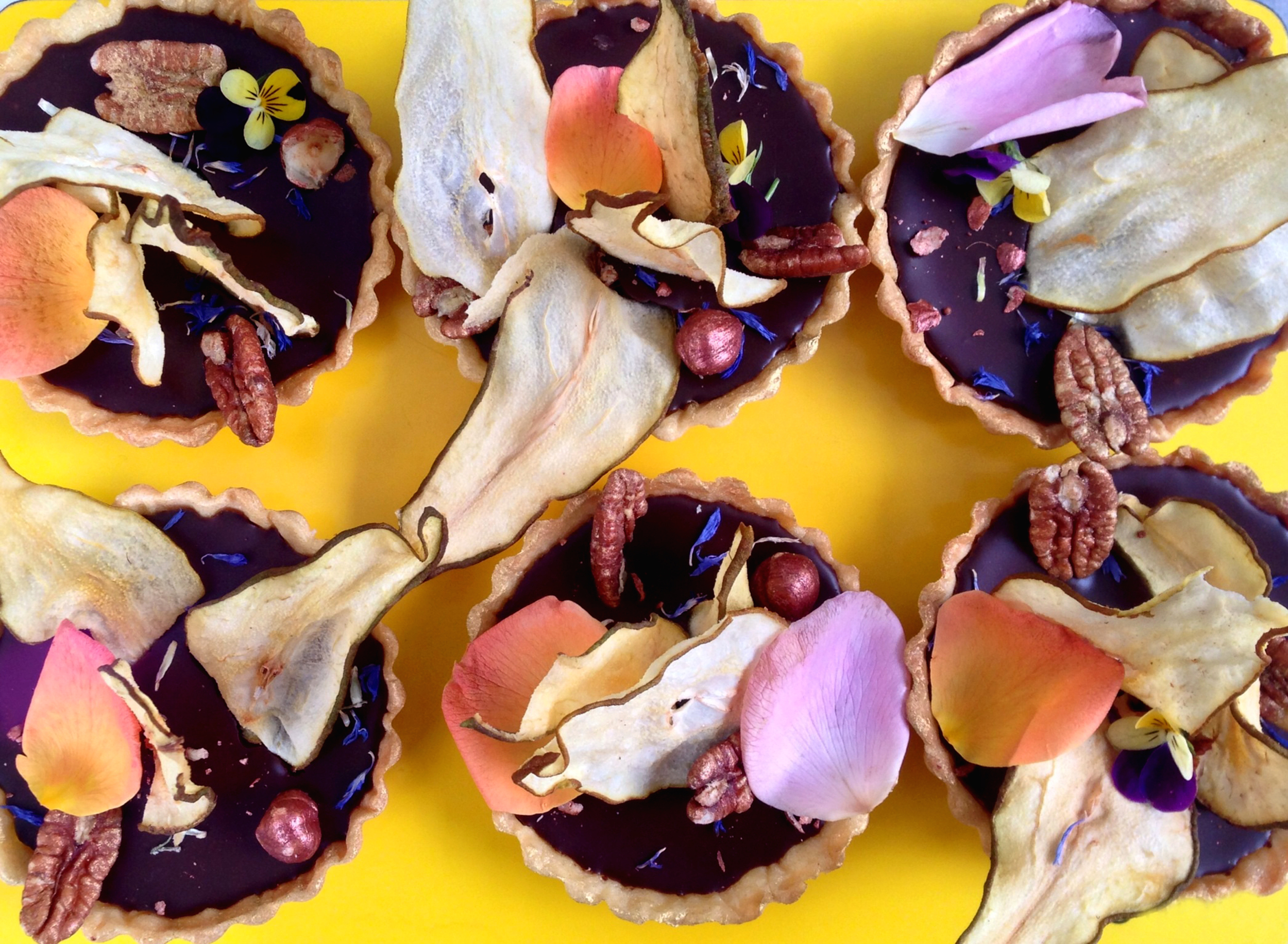 Pear Petal, Hazelnut, Pecan Chocolate Ganache Tarts