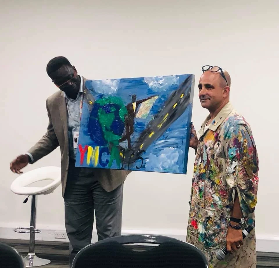 "A Global Vision" painting created LIVE in London at YMCA150 for YMCA Secretary General Carlos Sanvee