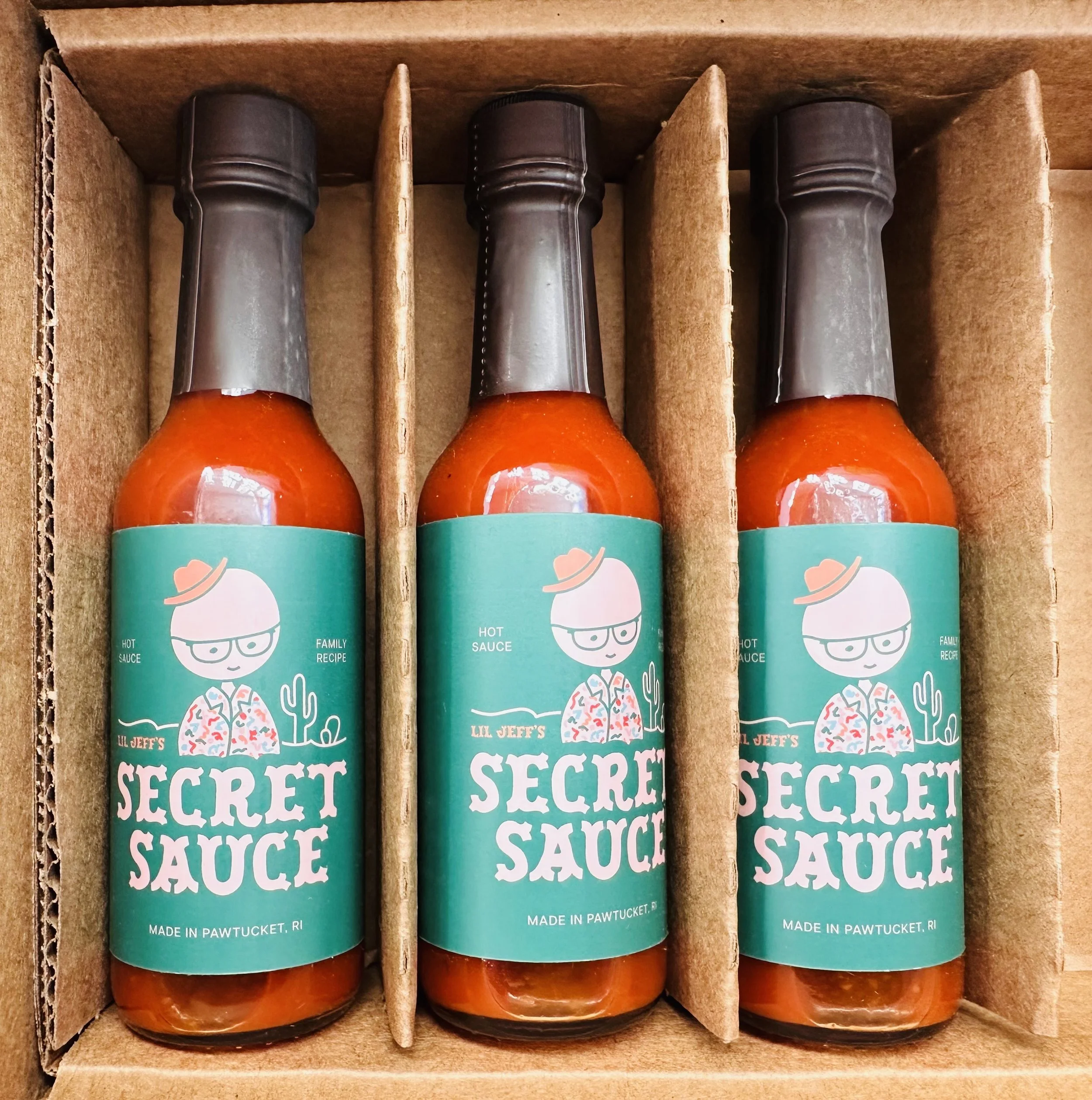 Jeff's "secret sauce" in real life sauce bottles