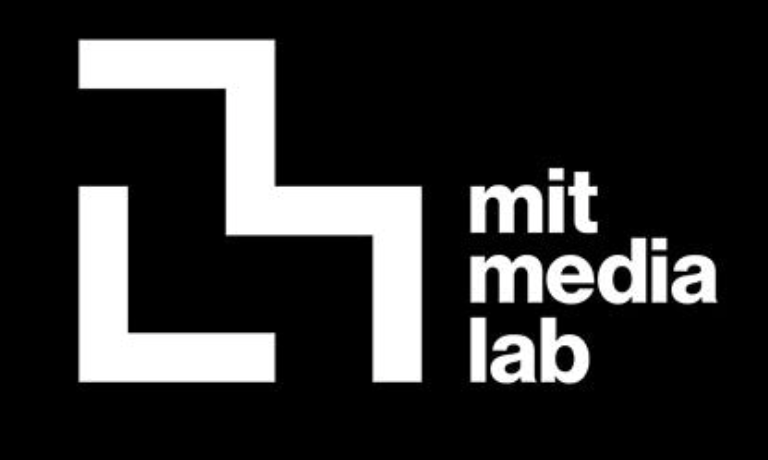 Black background with a white geometric logo and the words 'mit media lab' in white text.