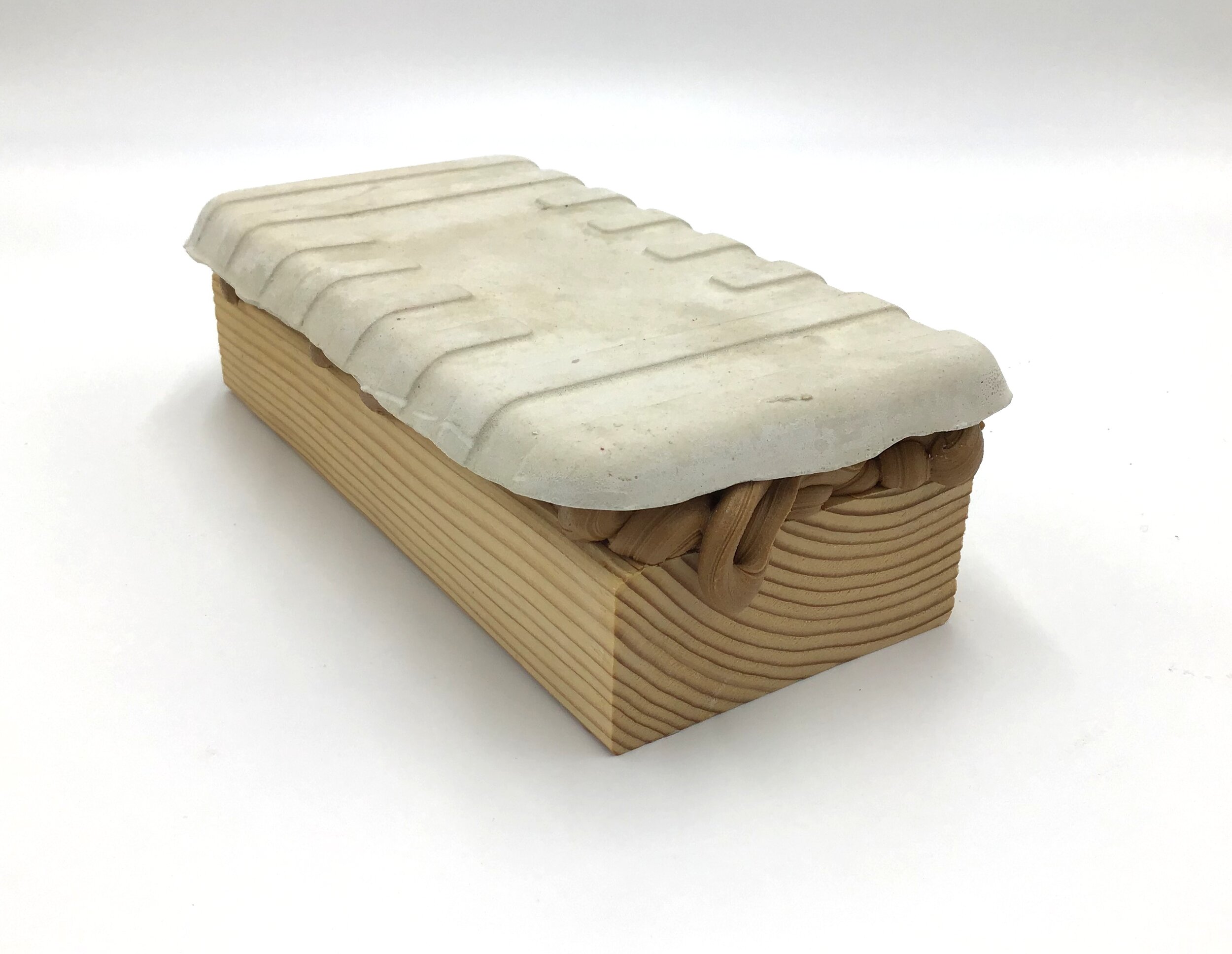 Sandwich, plaster, wood, wood caulk 2 3/4” high X 9” long X 5” wide (2019)