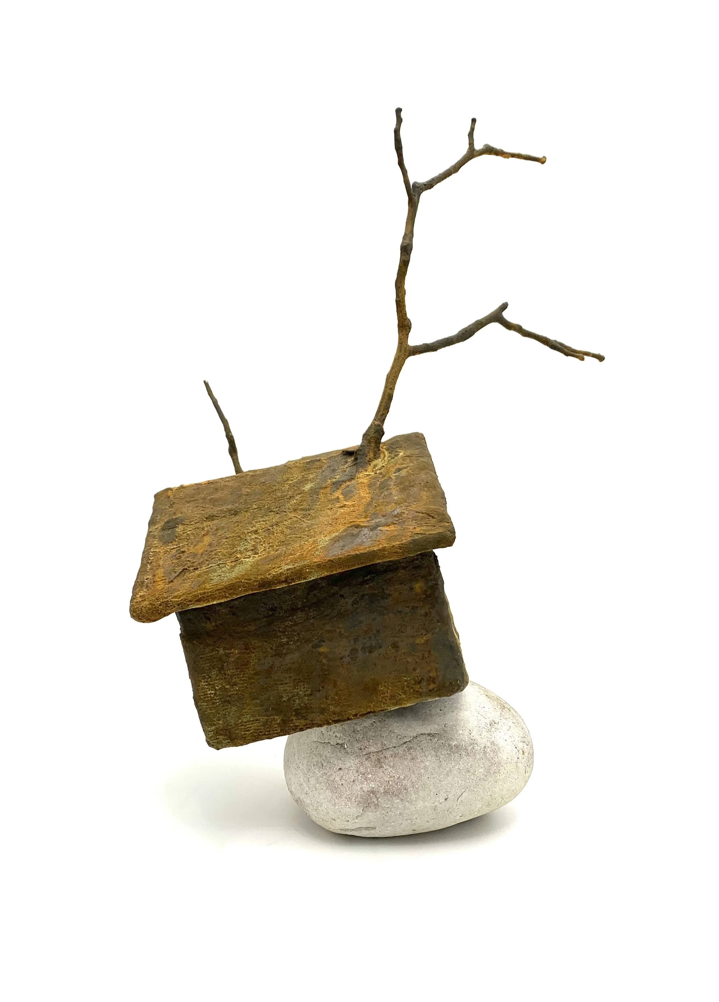   Homestead , rock , twigs, wire, cardboard,  plaster guaze, iron metallic paint, rust  activator, 19.5"H X 14"W X 12"D (2025) 