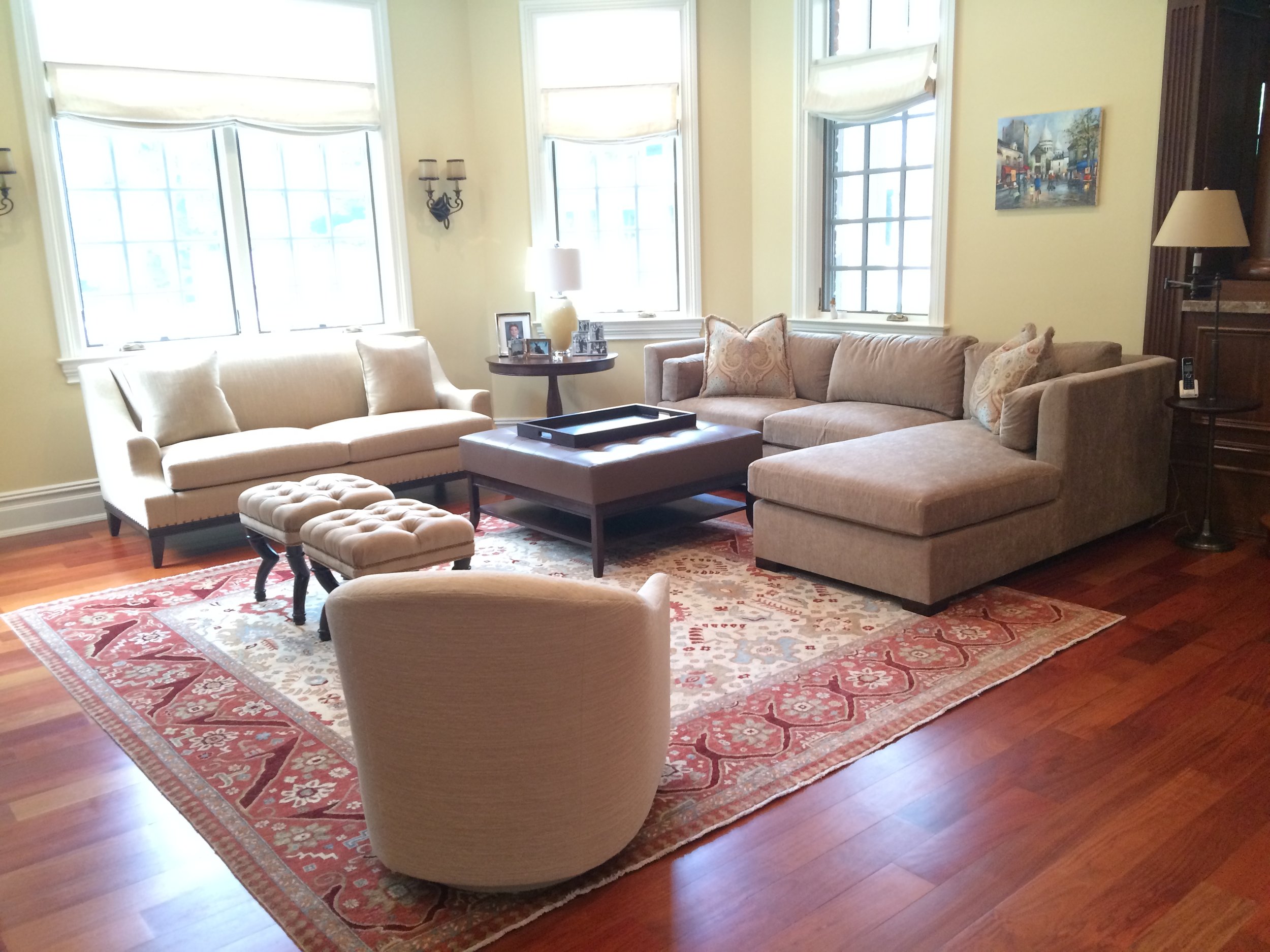 Traditional family room designed for hosting parties with oriental rug and sectional sofa performance fabrics 