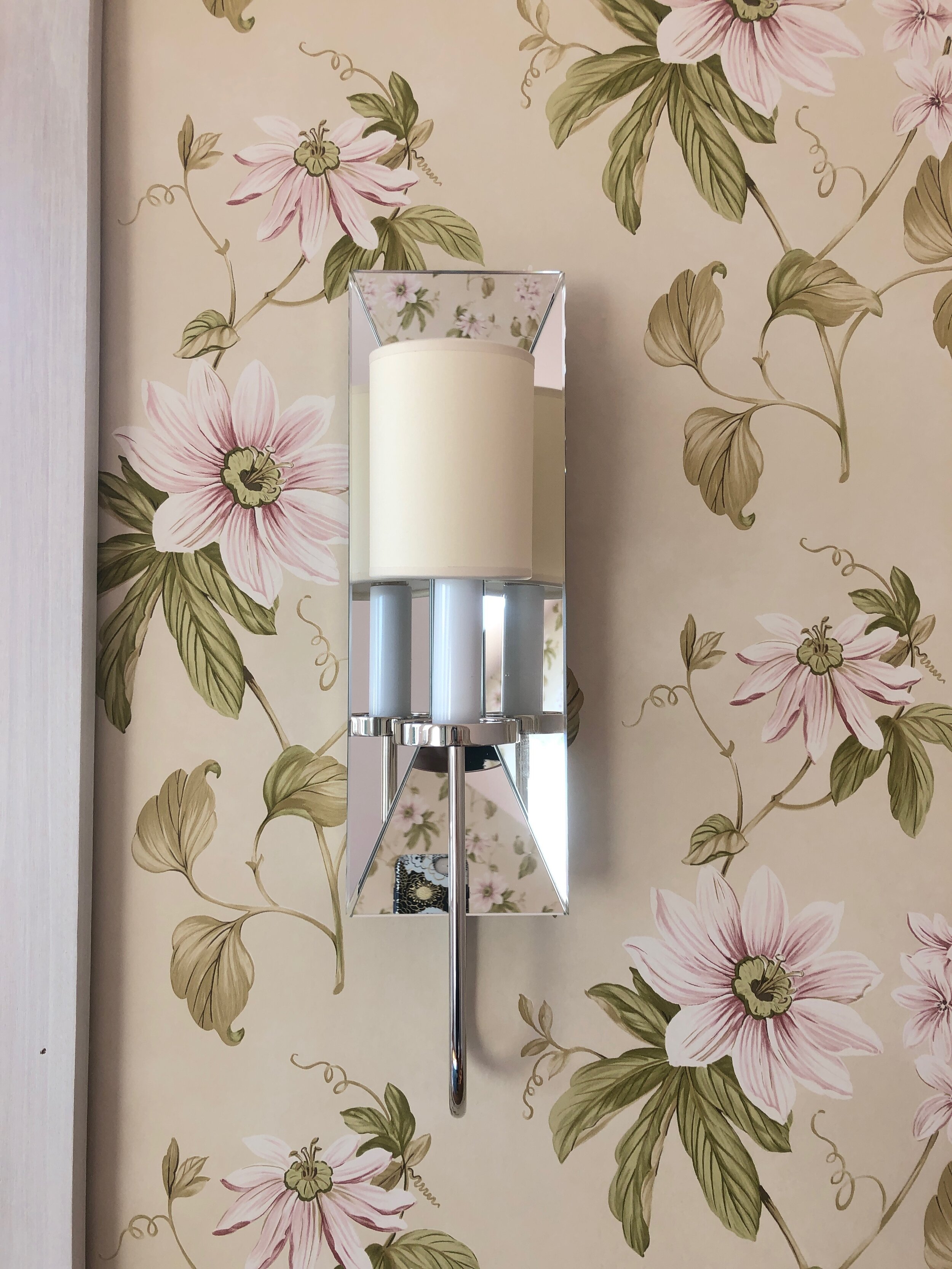 Mirror glass sconce detail_floral wallpaper_montclair luxury office design