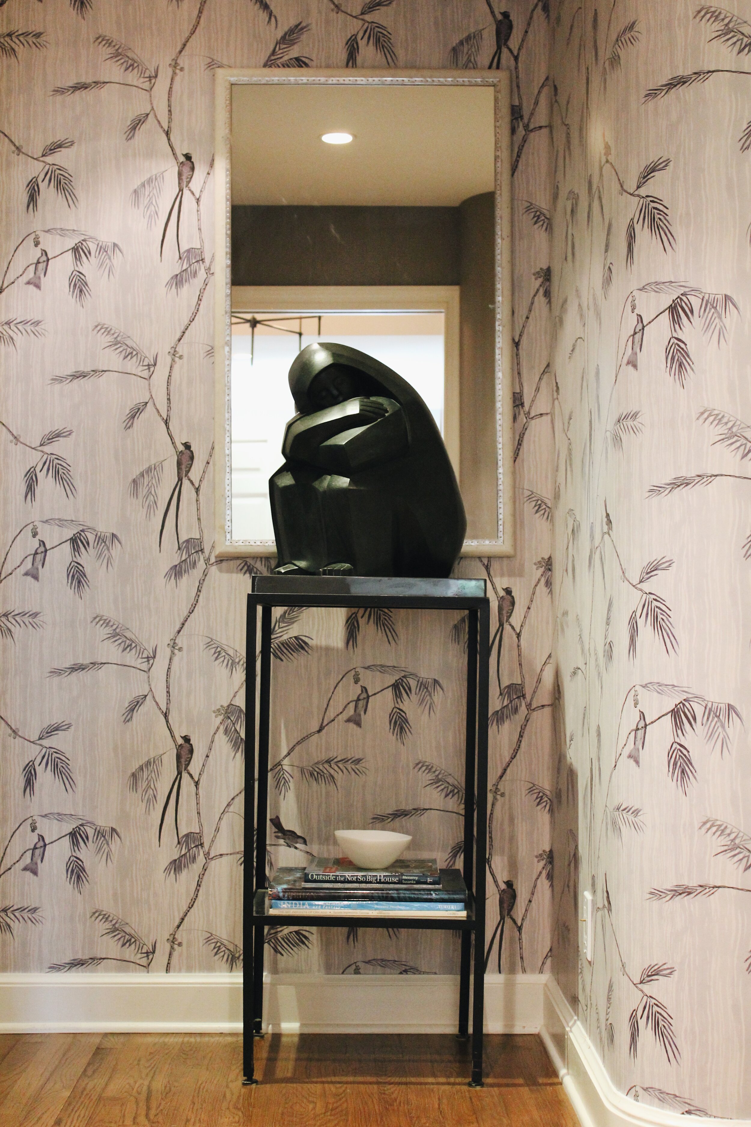 Sculpture with floral_branches wallpaper_hallway upper montclair home 